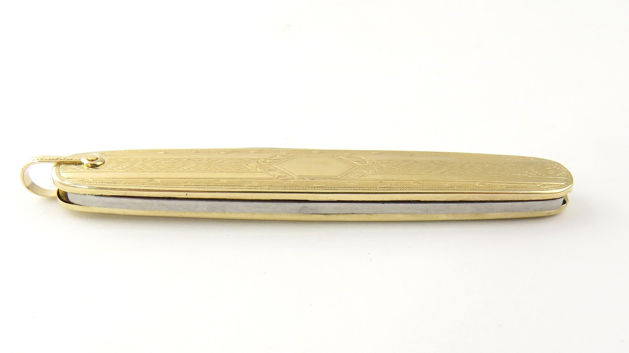 Vintage 14 Karat Yellow Gold and Stainless Steel Pocket Knife

This lovely pocket knife features two stainless steel blades housed in a textured 14K gold case with a polished bar on which a monogram can be engraved.

Size: 67 mm x 14 mm

Weight: