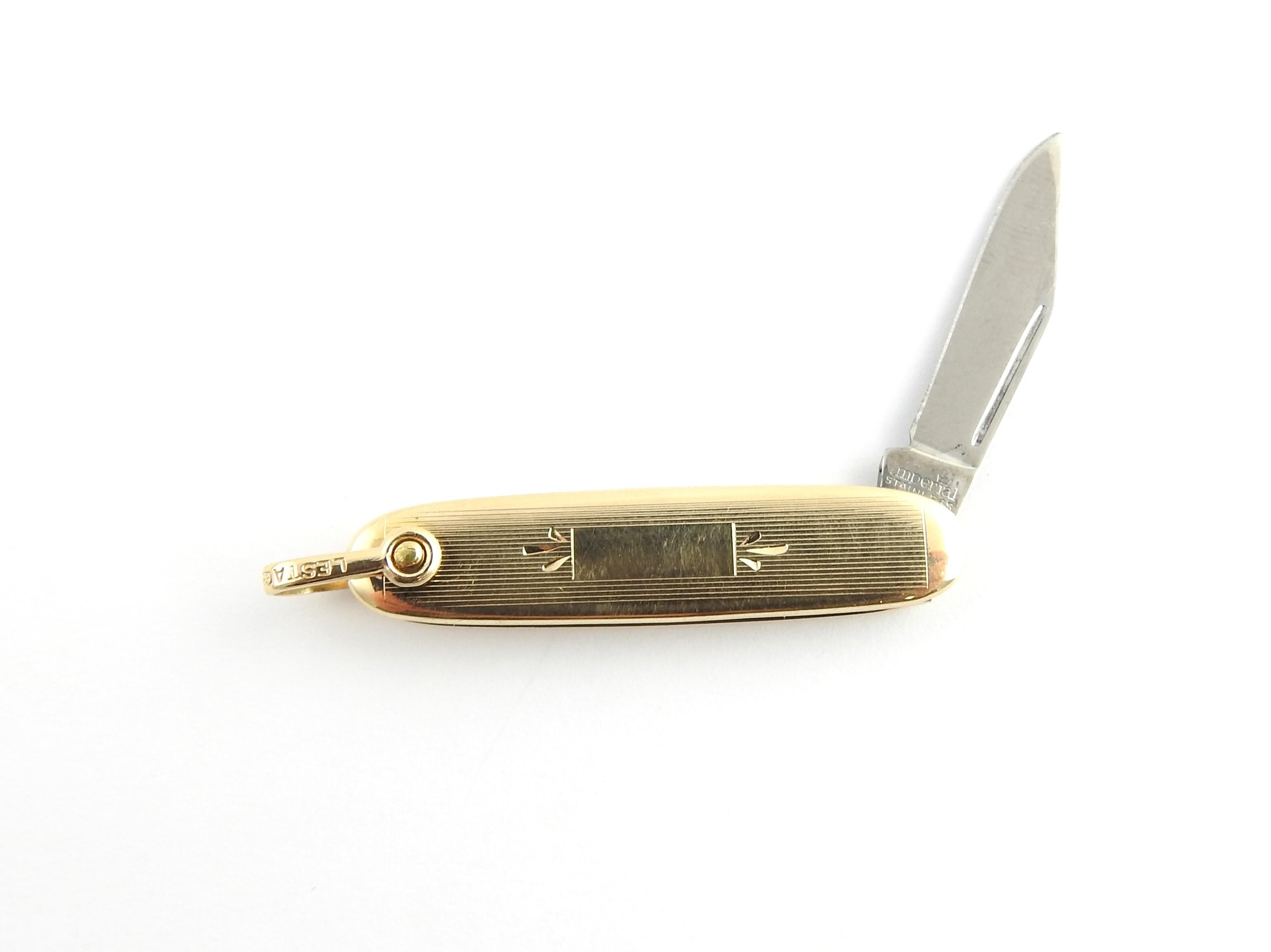 14 Karat Yellow Gold and Stainless Steel Pocket Knife 1