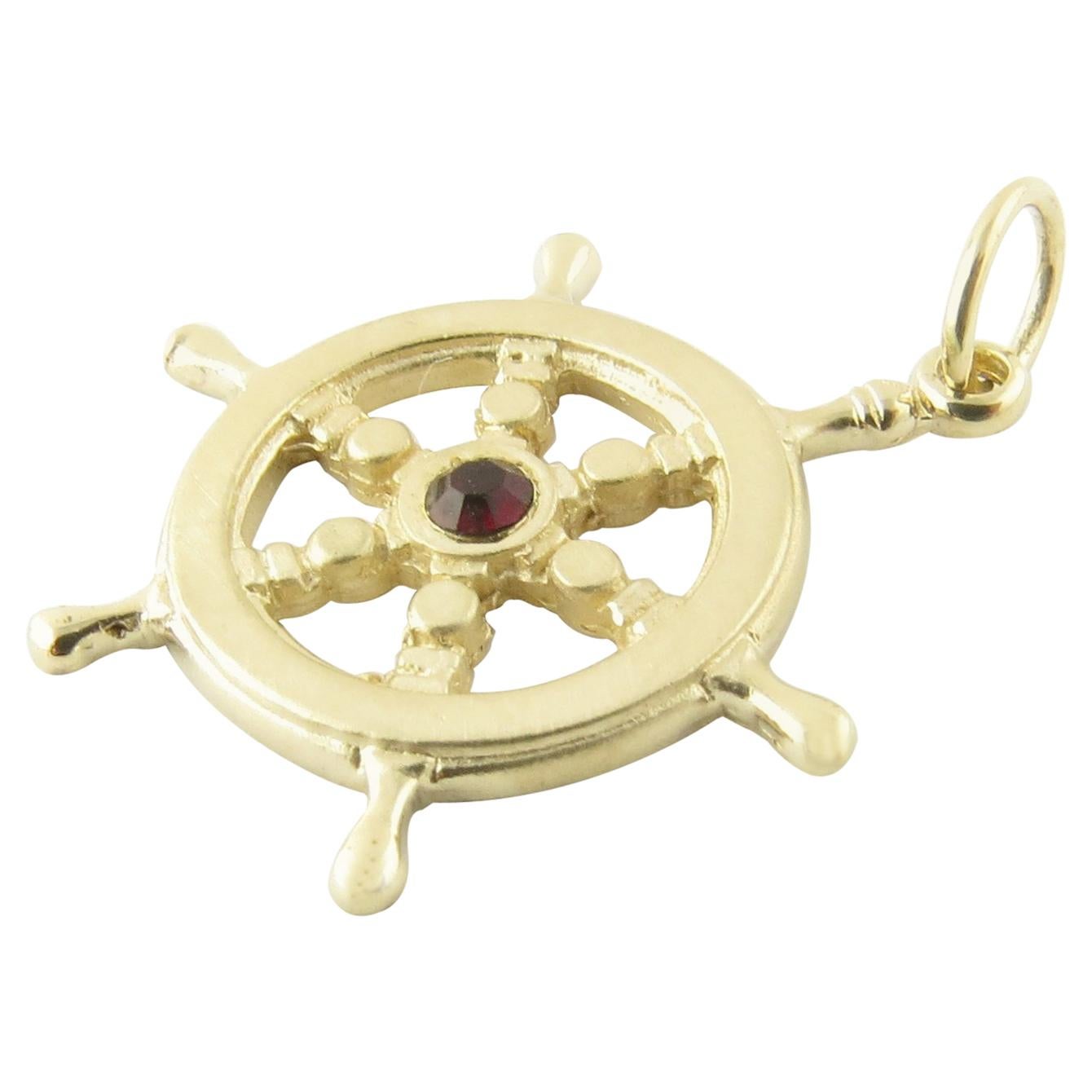 14 Karat Yellow Gold and Synthetic Ruby Ship's Wheel Pendant