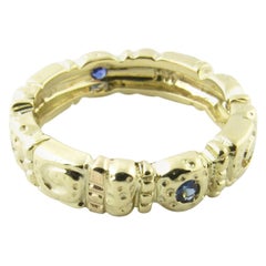 Anillo de oro amarillo de 14 quilates y tanzanita