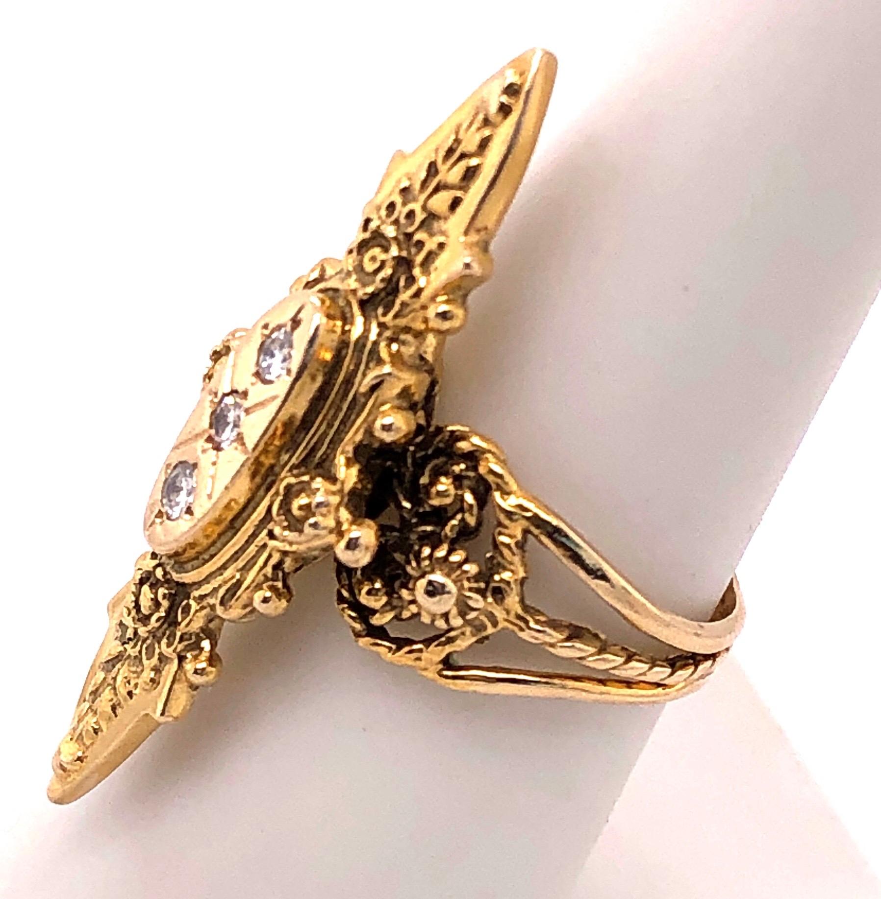 14 Karat Yellow Gold Free Form Ring with Three Round Diamonds.
0.25 Total diamond weight.
Size 7.75
6.83 grams total weight.
This ring can be resized however, we do not provide this service. You would have to have your local jeweler do this for you. 