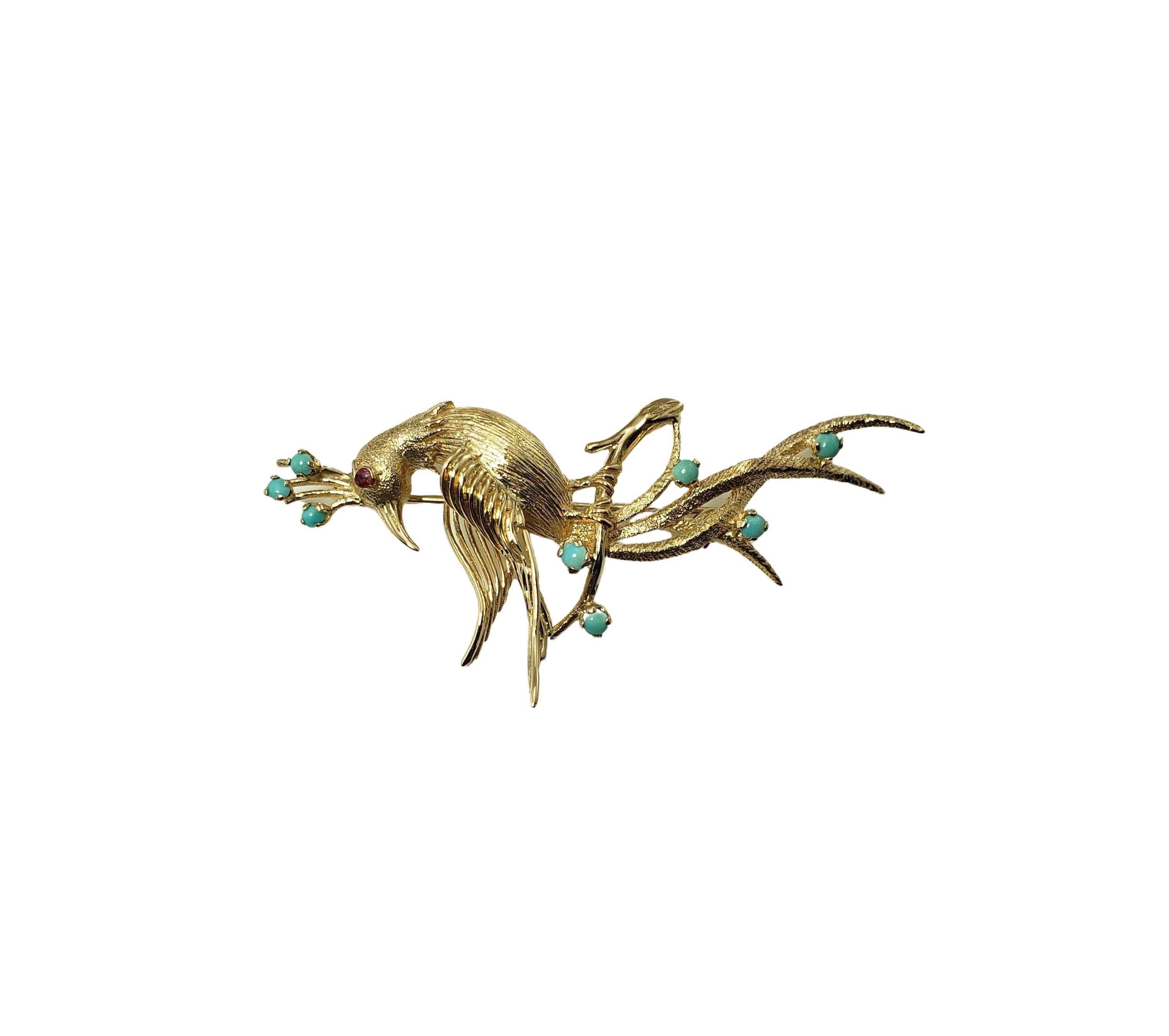 14 Karat Yellow Gold and Turquoise Peacock Brooch/Pin-

This lovely brooch features a majestic peacock accented with eight turquoise stone and two red faceted stone eyes set in beautifully detailed 14K yellow gold.

Size:  62 mm x 30 mm

Weight: 