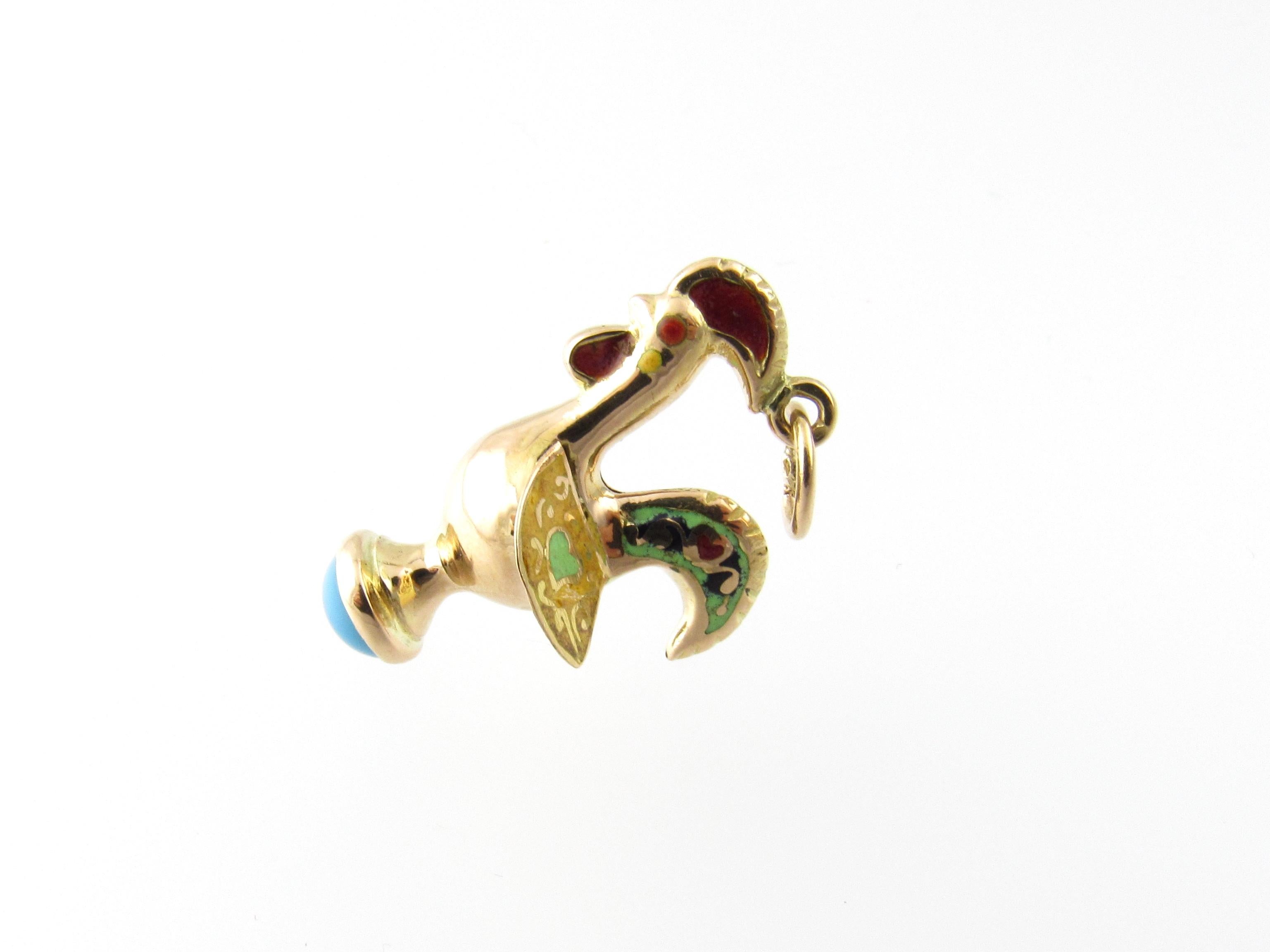 Vintage 14 Karat Yellow Gold and Turquoise Rooster Charm

Roosters signify fidelity, luck and protection.

This lovely charm features a 3D rooster decorated with colorful enamel and accented with a turquoise stone set in beautifully detailed 14K