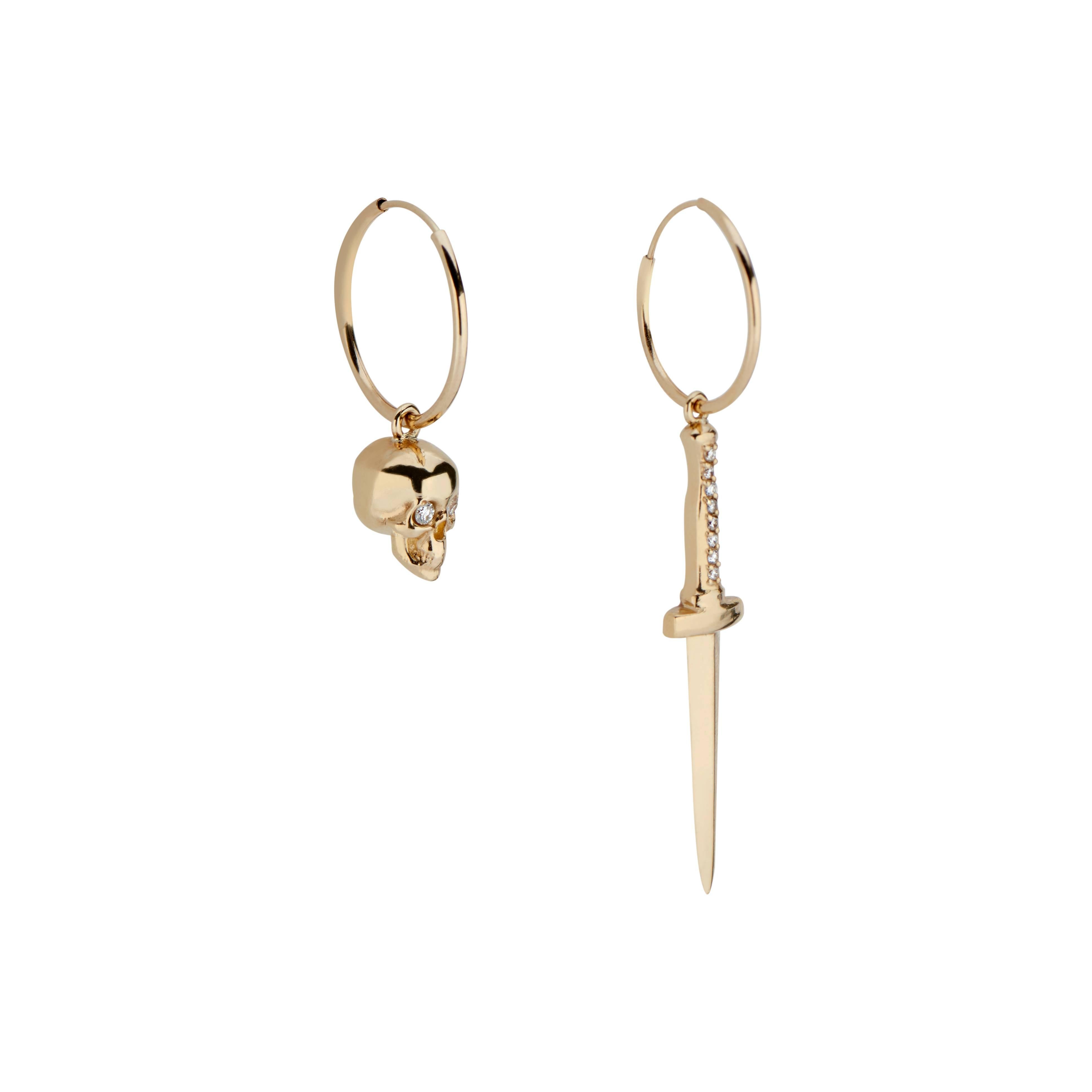 These 14k gold and diamond earrings combine one DRU. baby skull and one DRU. dagger for an edgy, yet sophisticated look.  Skulls represent mortality and the path that connects us all, and daggers have long symbolized bravery and courage.  Together,
