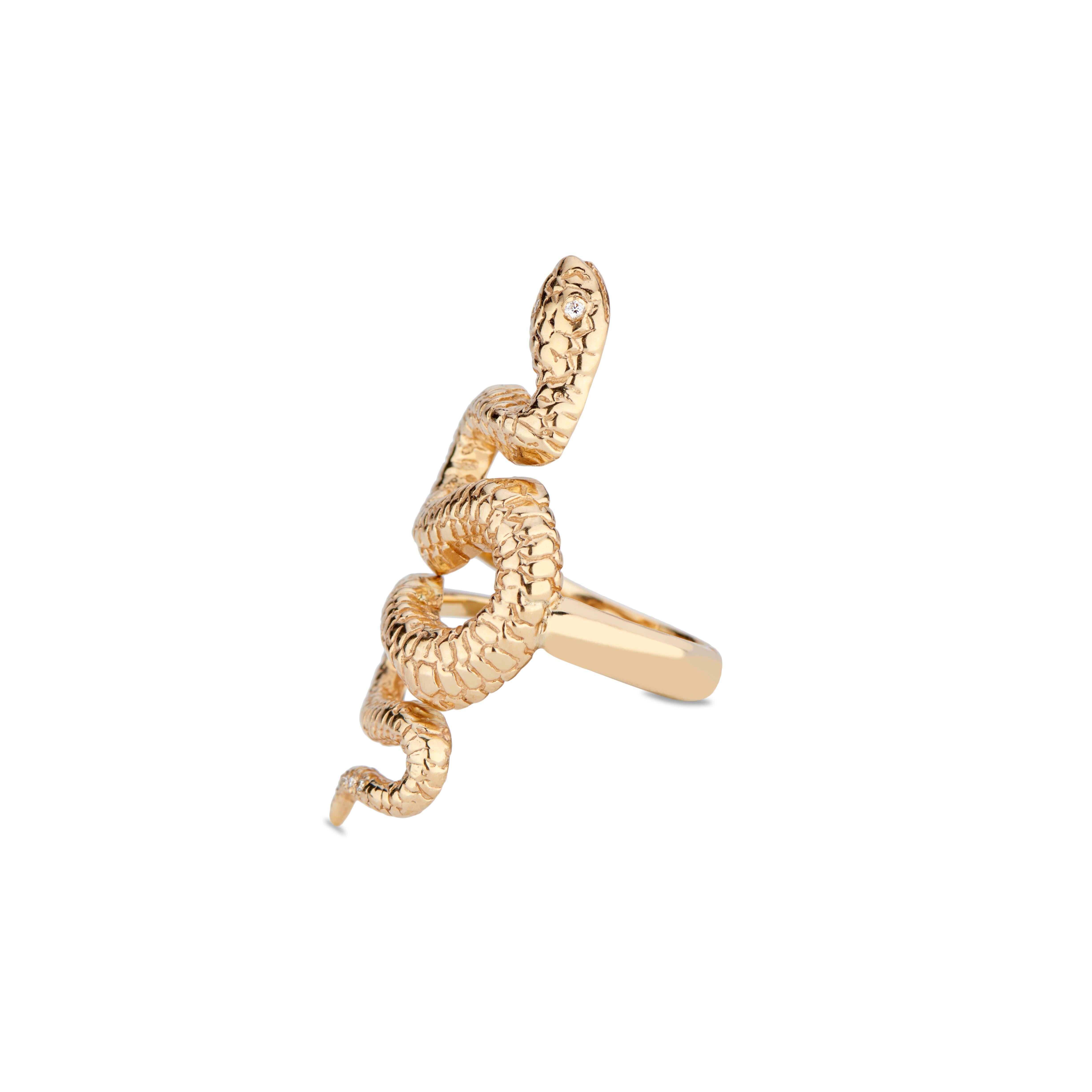 Showing the snake in its entirety, the Snake Ring was designed to be noticed. It has 2 small diamonds set for the eyes and 6 set on its tail. The unique asymmetrical shank features two different views. The snake’s left side is joined to the shank