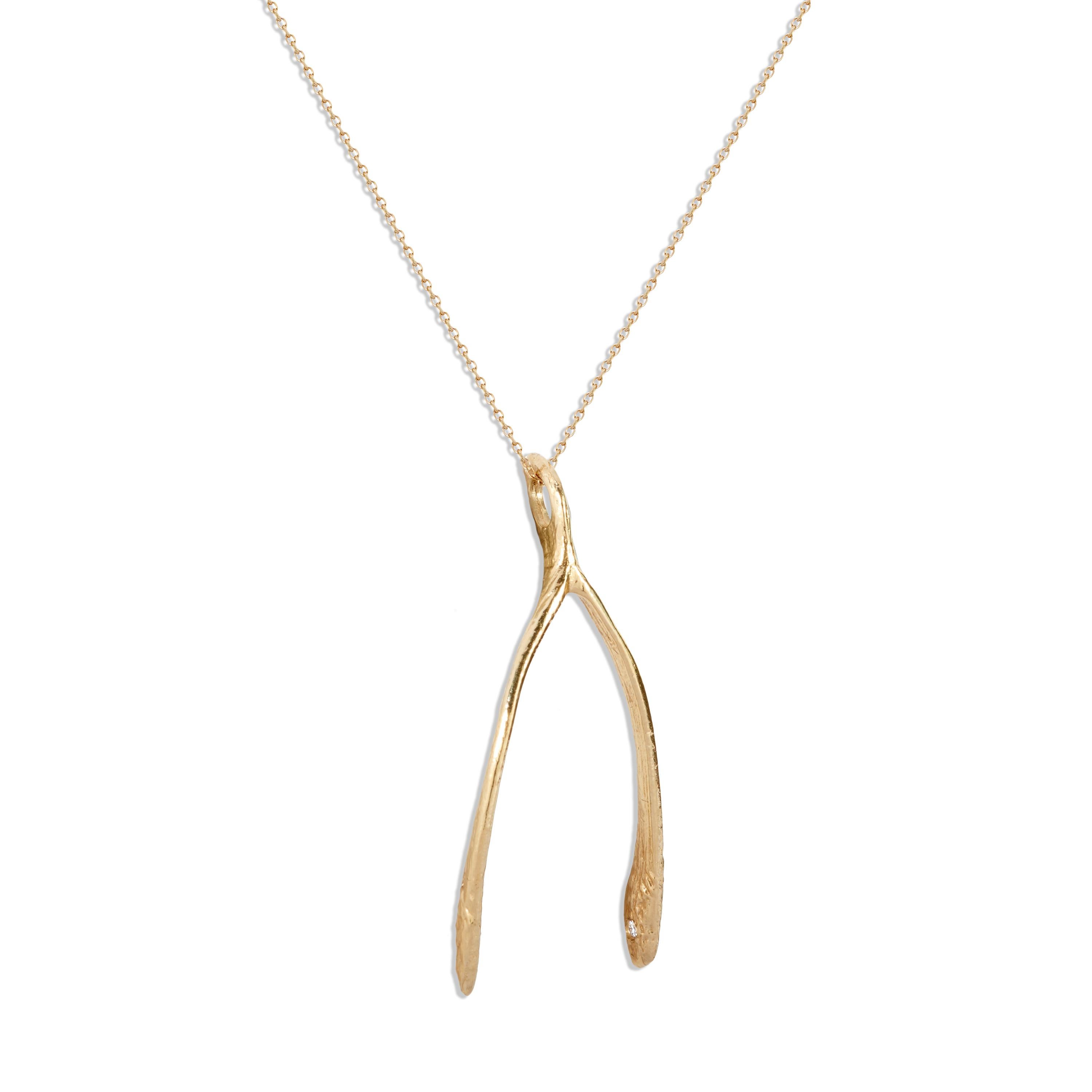This 14k gold and white diamond wishbone pendant is a fun reminder of childhood and the ease with which wishes were once made. It is a substantial piece with an organic brushed look and feel.  The best part of this pendant is the 3 diamonds (2 mm)