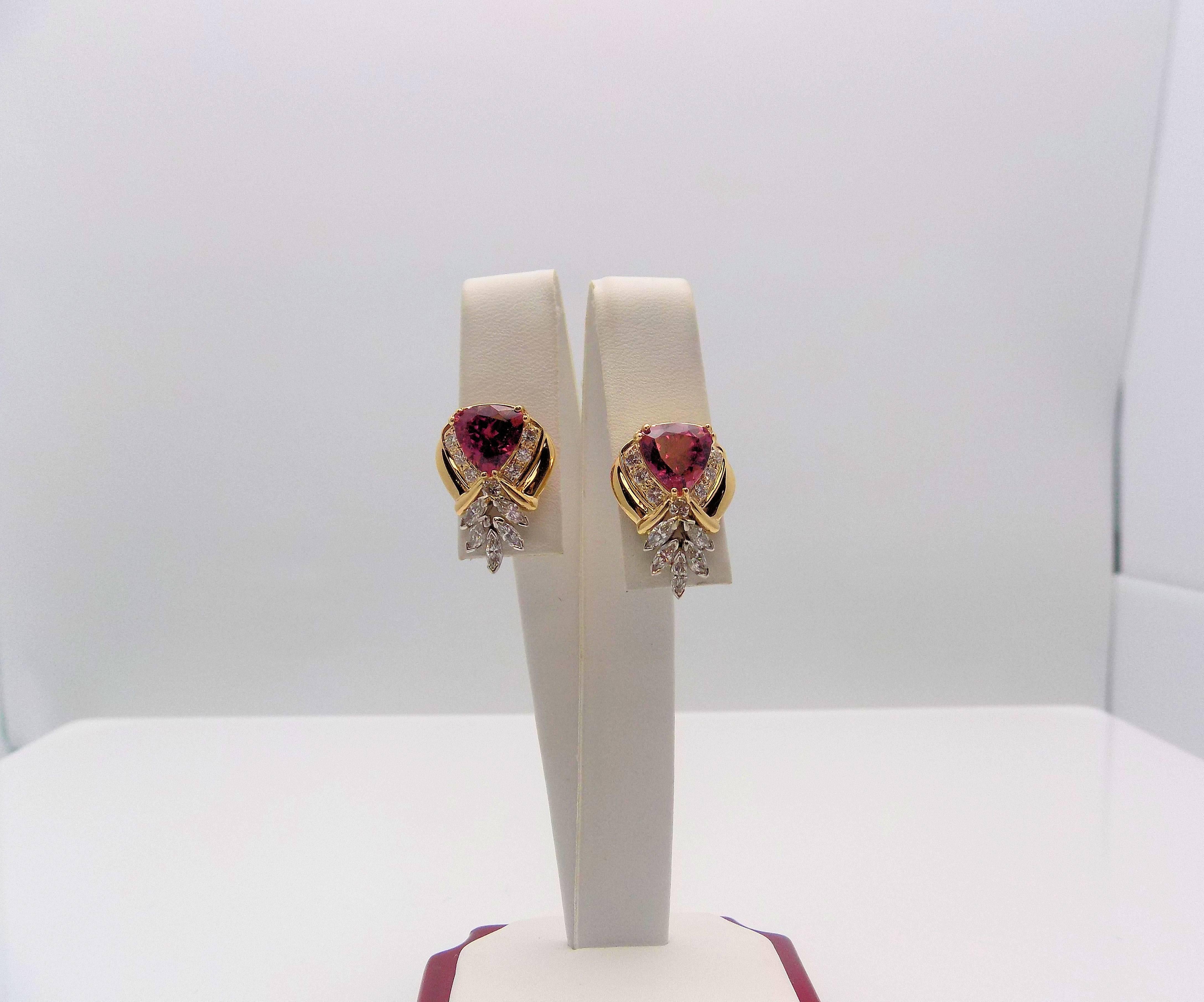 Pair 14 Karat Yellow Gold/White Gold Pierced Earrings. 2 Trillion Cut Pink Tourmalines 3.00 Carat Total Weight; 14 Round Brilliant Diamonds, 10 Marquis Cut Diamonds 0.85 Carat Total Weight, SI, H-I; Gold Filled Backs; 4.5 DWT or 6.99 Grams.