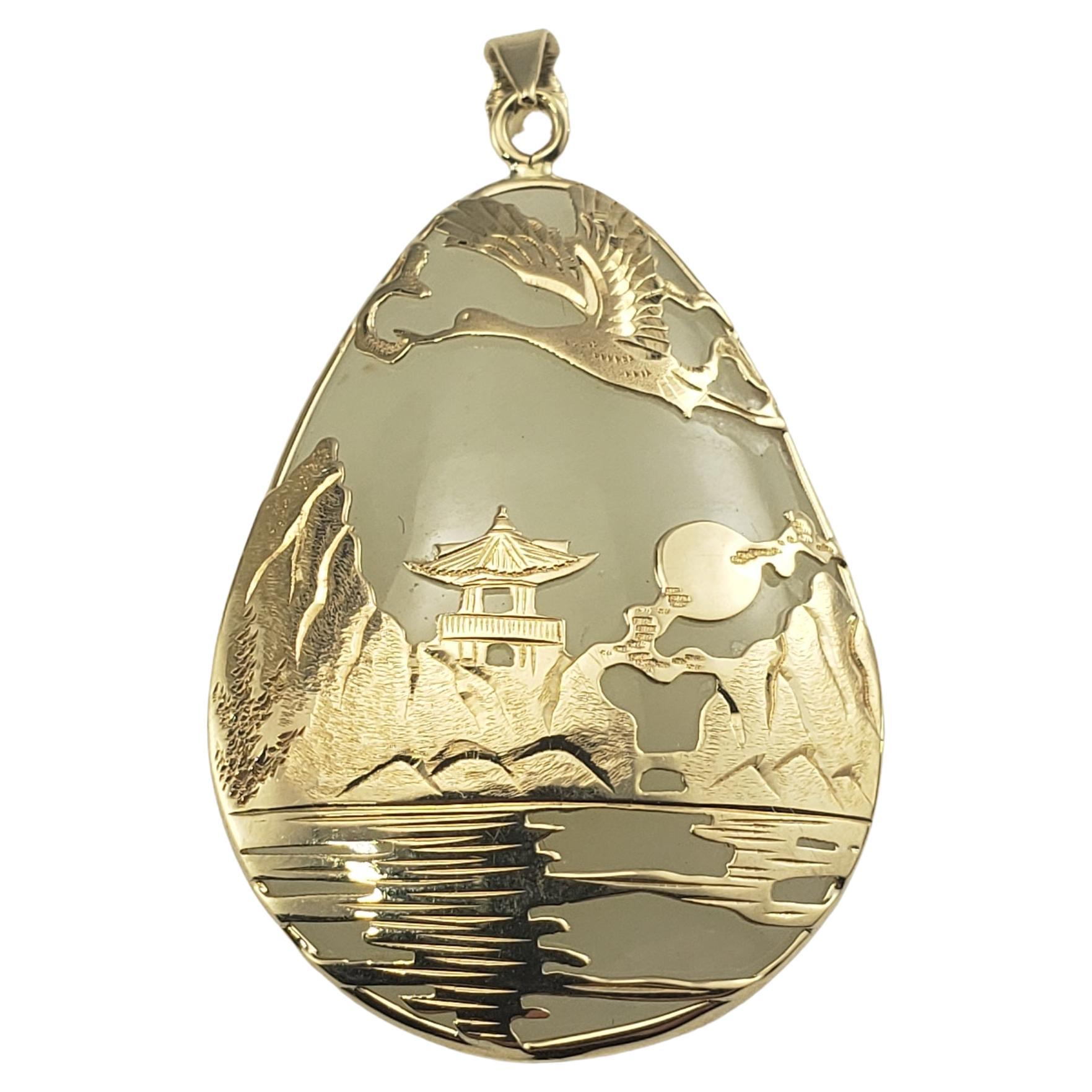 Pendentif en or jaune 14 carats et jade blanc