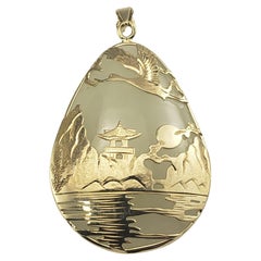 Pendentif en or jaune 14 carats et jade blanc