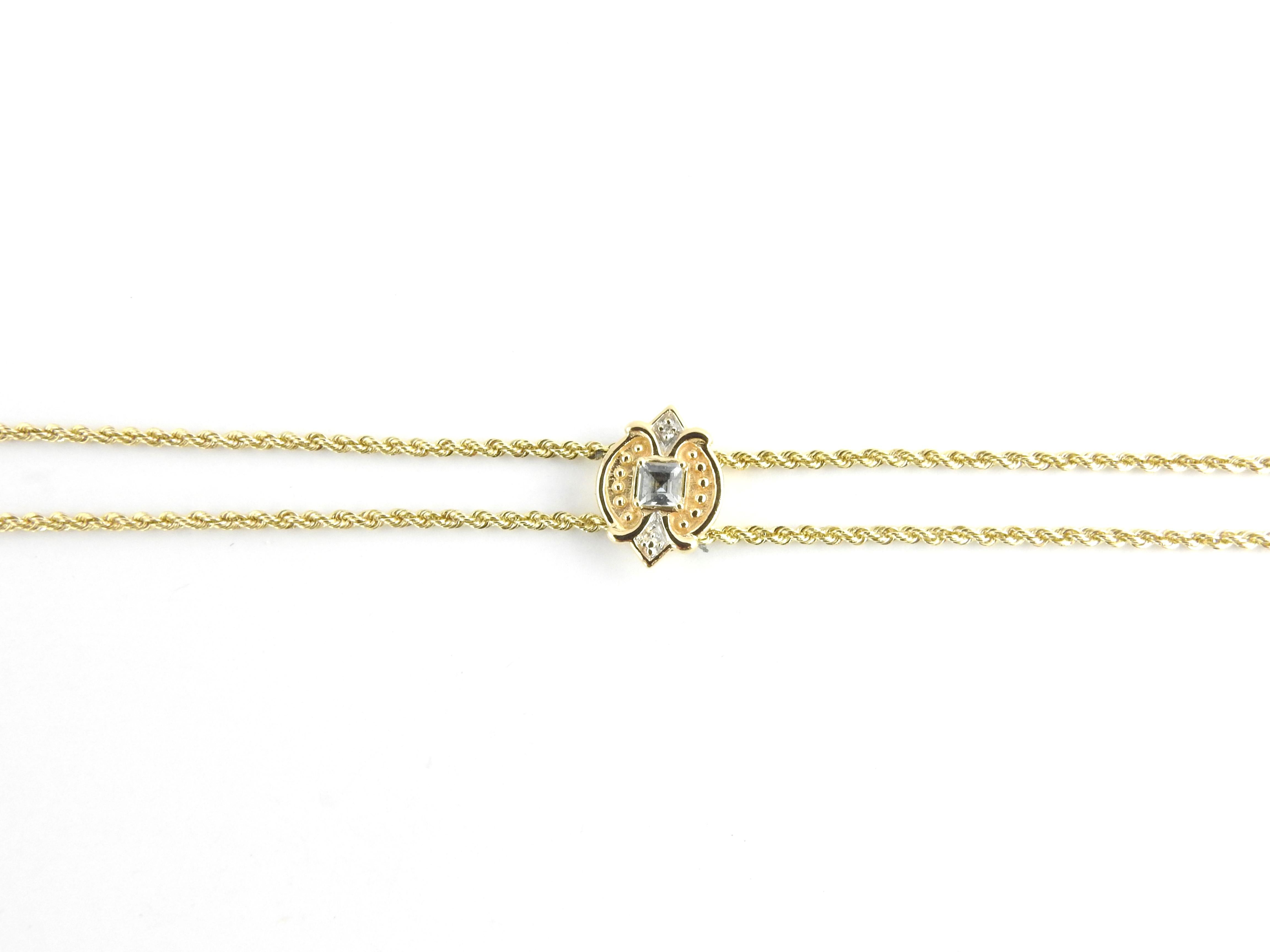 Vintage 14 Karat Yellow Gold Aquamarine and Diamond Bracelet-

This elegant bracelet features one square aquamarine (4 mm x 4 mm) and one round single cut diamond set in beautifully detailed 14K yellow gold on a classic double rope bracelet. Top of
