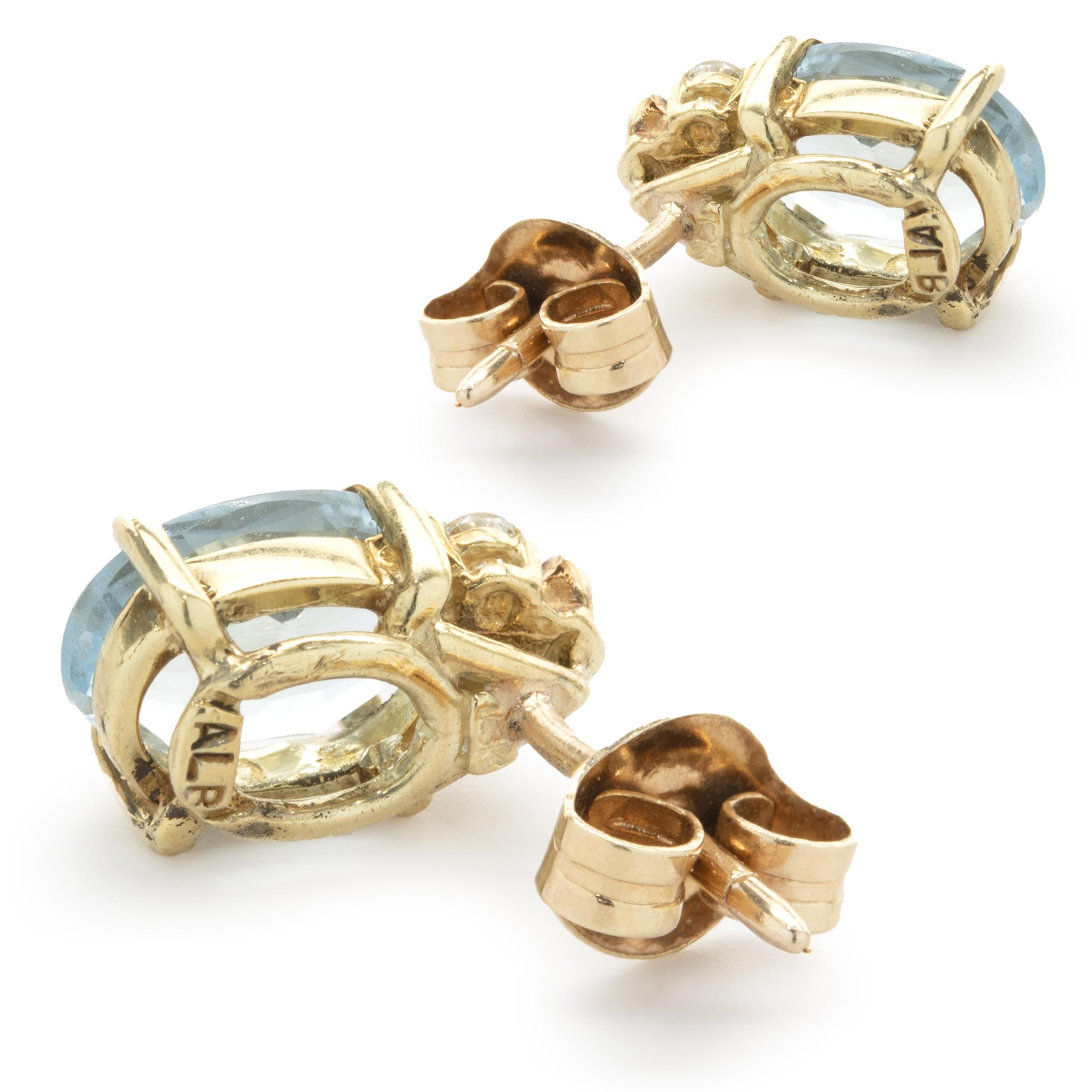 Oval Cut 14 Karat Yellow Gold Aquamarine and Diamond Earrings