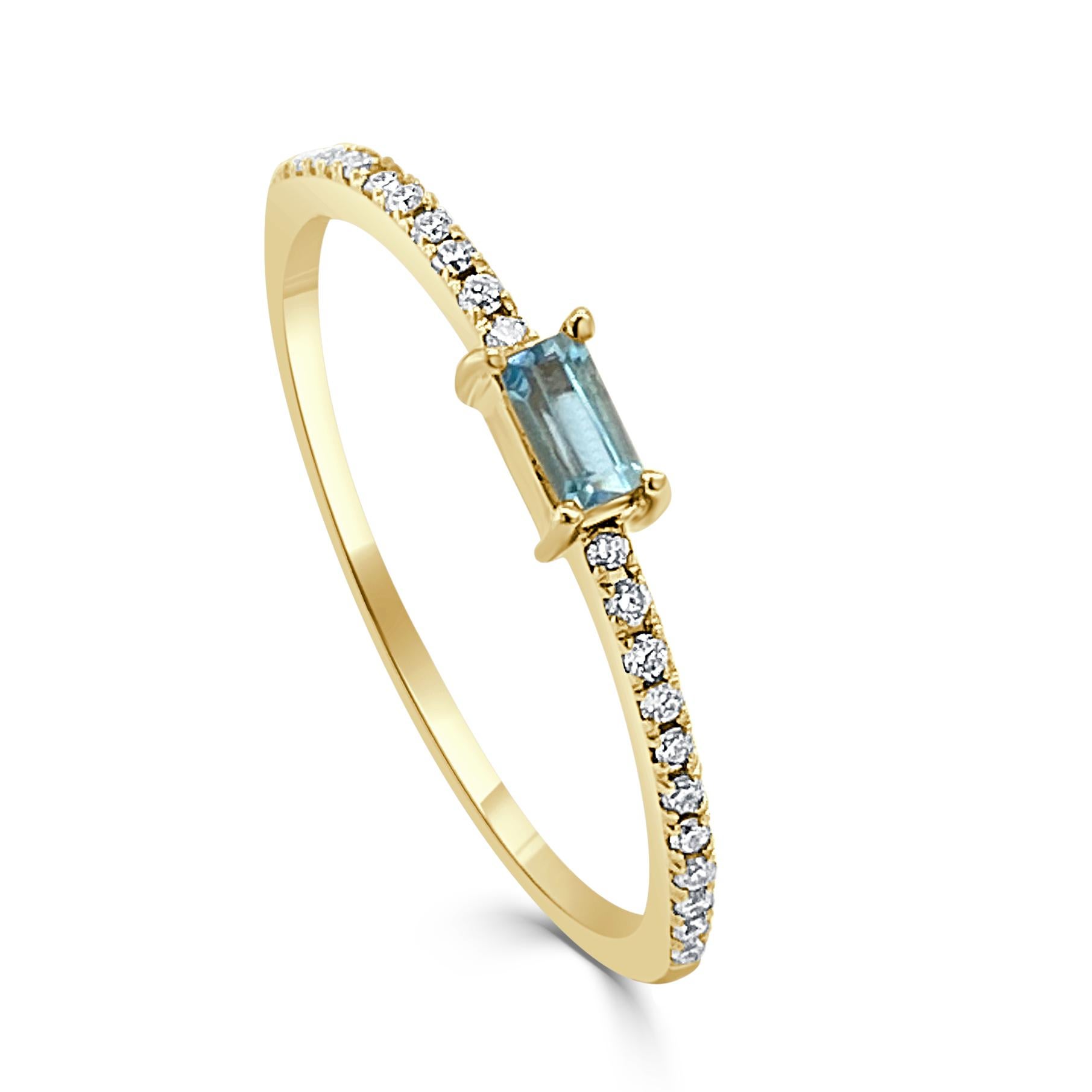 Charming and Elusive Design - This stackable ring features a 14k gold band, a baguette shaped gorgeous blue topaz approximately 0.16 ct, and round diamonds approximately 0.09 ct. 
Measurements for ring size: The finger Size of the ring is 6.5 and