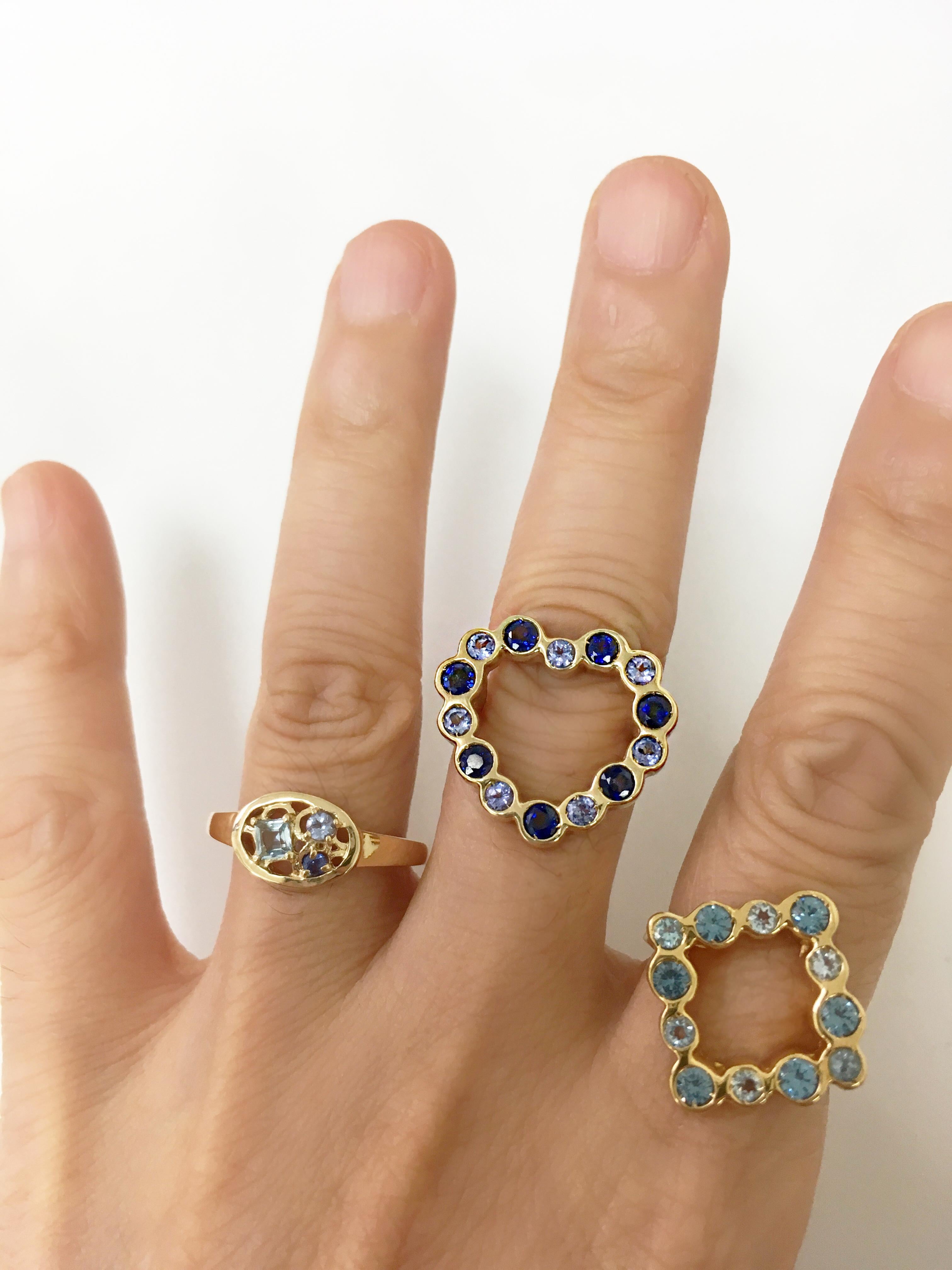 Contemporary 14 Karat Yellow Gold Aquamarine, Tanzanite and Blue Sapphire Ring