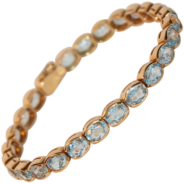 14 Karat Yellow Gold Aquamarine Tennis Bracelet, Set with 26