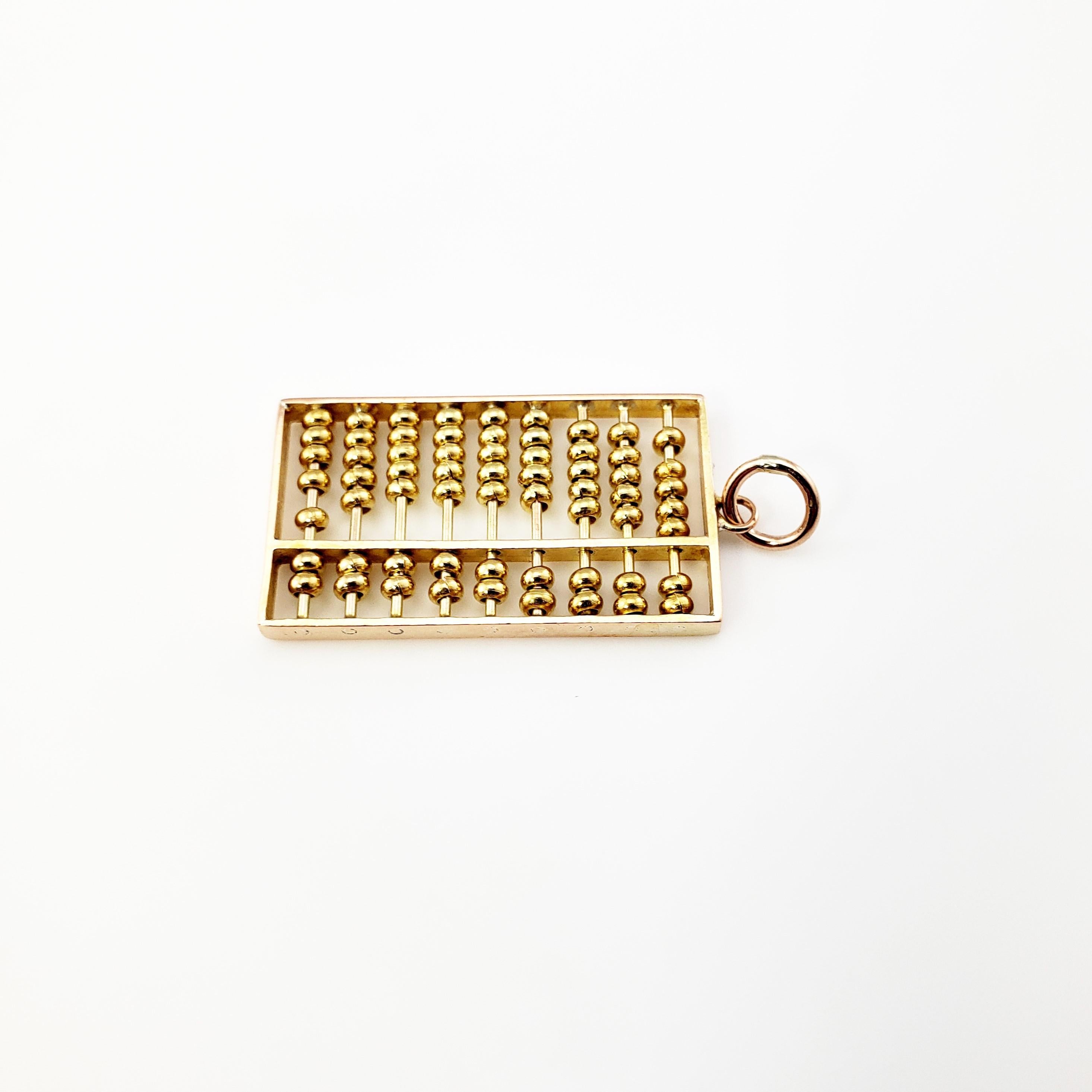 Vintage 14 Karat Yellow Gold Articulated Abacus Charm

Perfect gift for the mathematician in your life!

This lovely 3D charm features a beautifully detailed abacus with moving beads crafted in classic 14K yellow gold.

Size: 29 mm x 15 mm actual