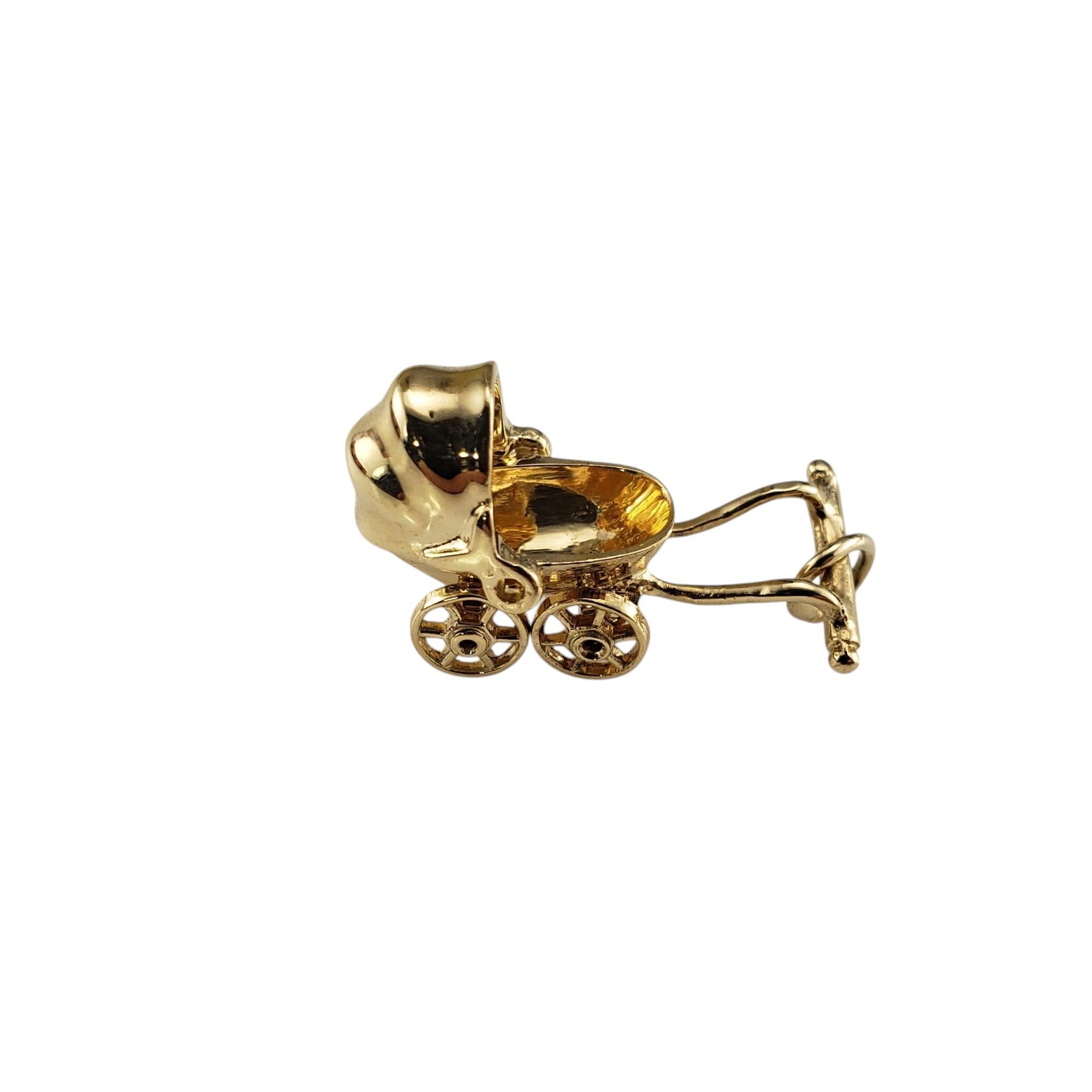 14 Karat Yellow Gold Articulated Baby Carriage Charm-

Celebrate the new addition!

This adorable 3D baby carriage charm features moveable wheels and hood. Crafted in 14K yellow gold.

Size: 20 mm x 13 mm

Weight: 1.7 dwt/ 2.6 gr

Stamped: 14K

Very