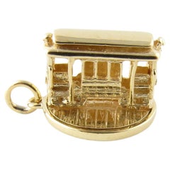 14 Karat Yellow Gold Articulated Cable Car Charm