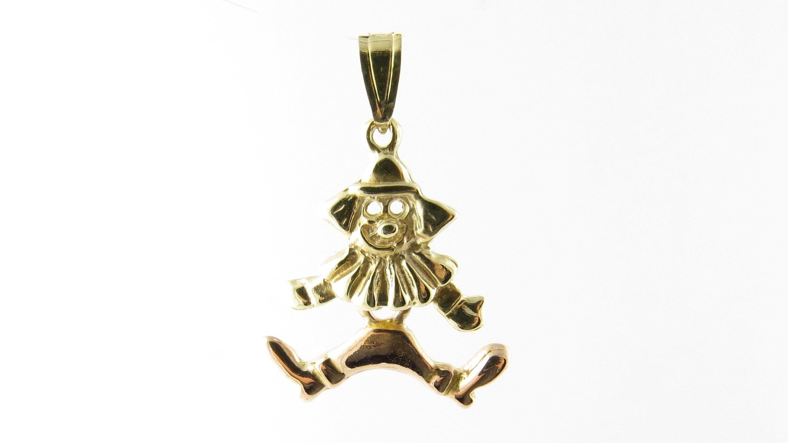 Vintage 14 Karat Yellow Gold Articulated Clown Charm- These whimsical charm features a delightful clown with dangling legs meticulously detailed in 14K yellow gold. Size: 22 mm x 20 mm (actual charm) Weight: 1.8 dwt. / 2.8 gr. Stamped: 14K Very good