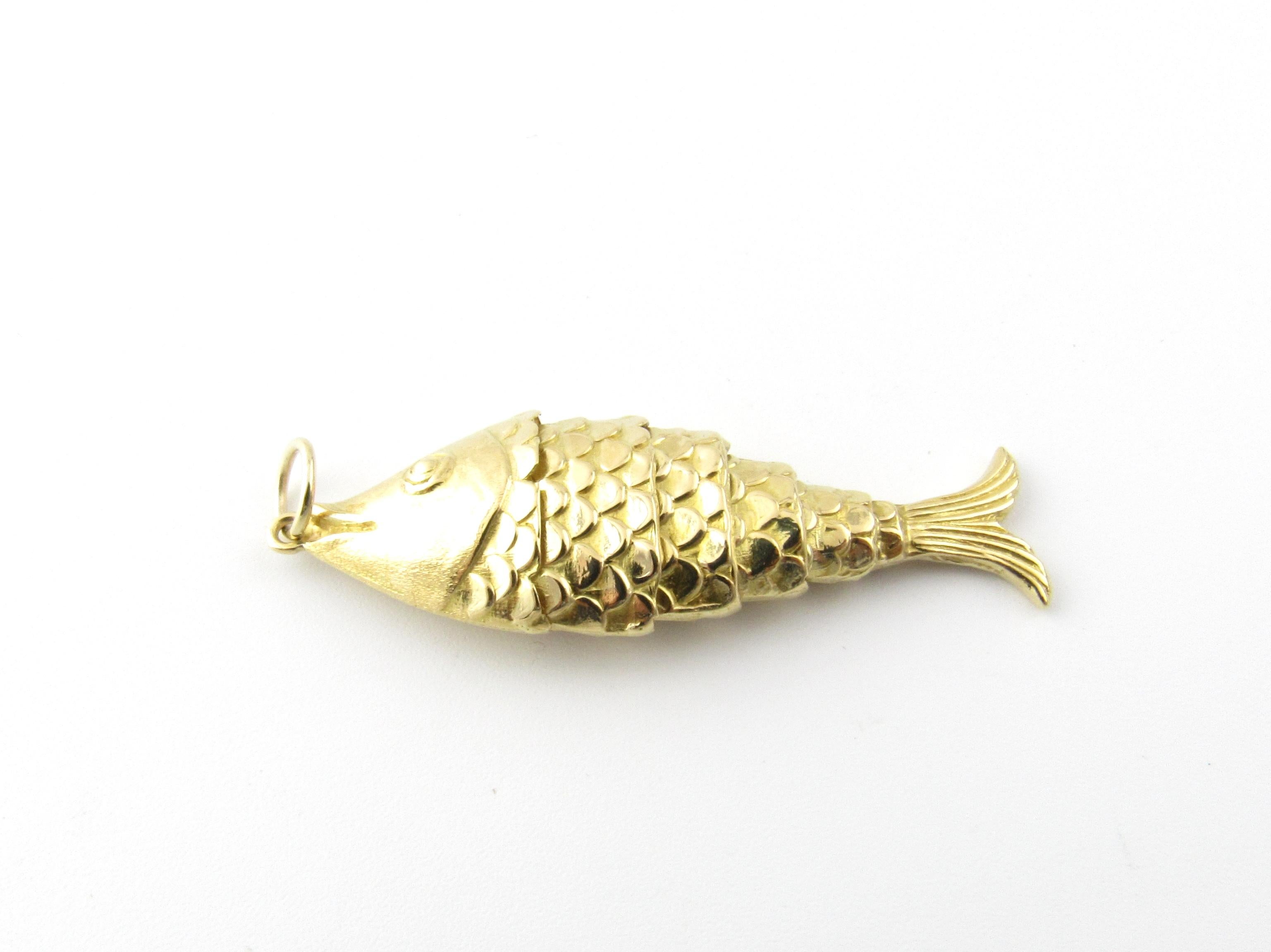 Vintage 14 Karat Yellow Gold Articulated Fish Pendant

This lovely 3D articulated pendant features a wriggling fish meticulously detailed in 14K yellow gold.

Size: 42 mm x 14 mm

Weight: 2.0 dwt. / 3.2 gr.

Acid tested for 14K gold.

Very good