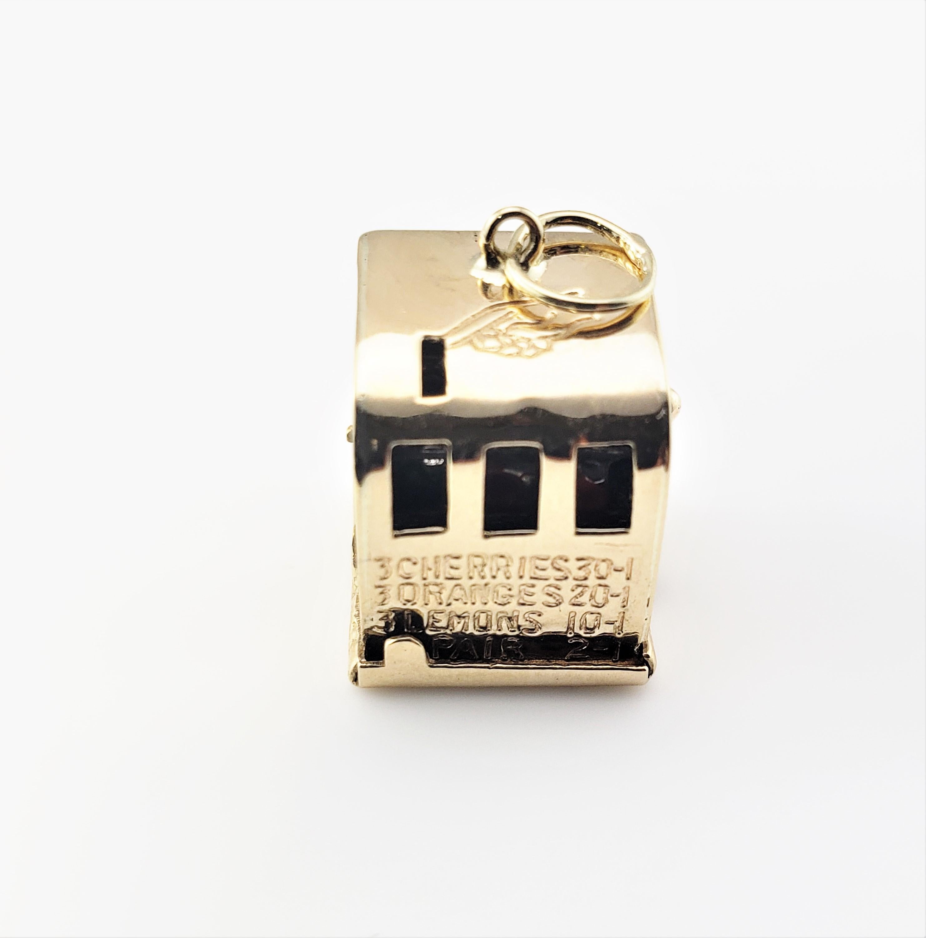 14 Karat Yellow Gold Articulated Slot Machine Charm-

Jackpot!

This lovely 3D charm features a miniature slot machine with working lever that spins that three inner wheels to reveal colored fruits.  Meticulously detailed in 14K yellow gold.

*Chain