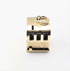 14 Karat Yellow Gold Articulated Slot Machine Charm