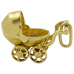 14 Karat Yellow Gold Articulating Baby Carriage Charm Pendant