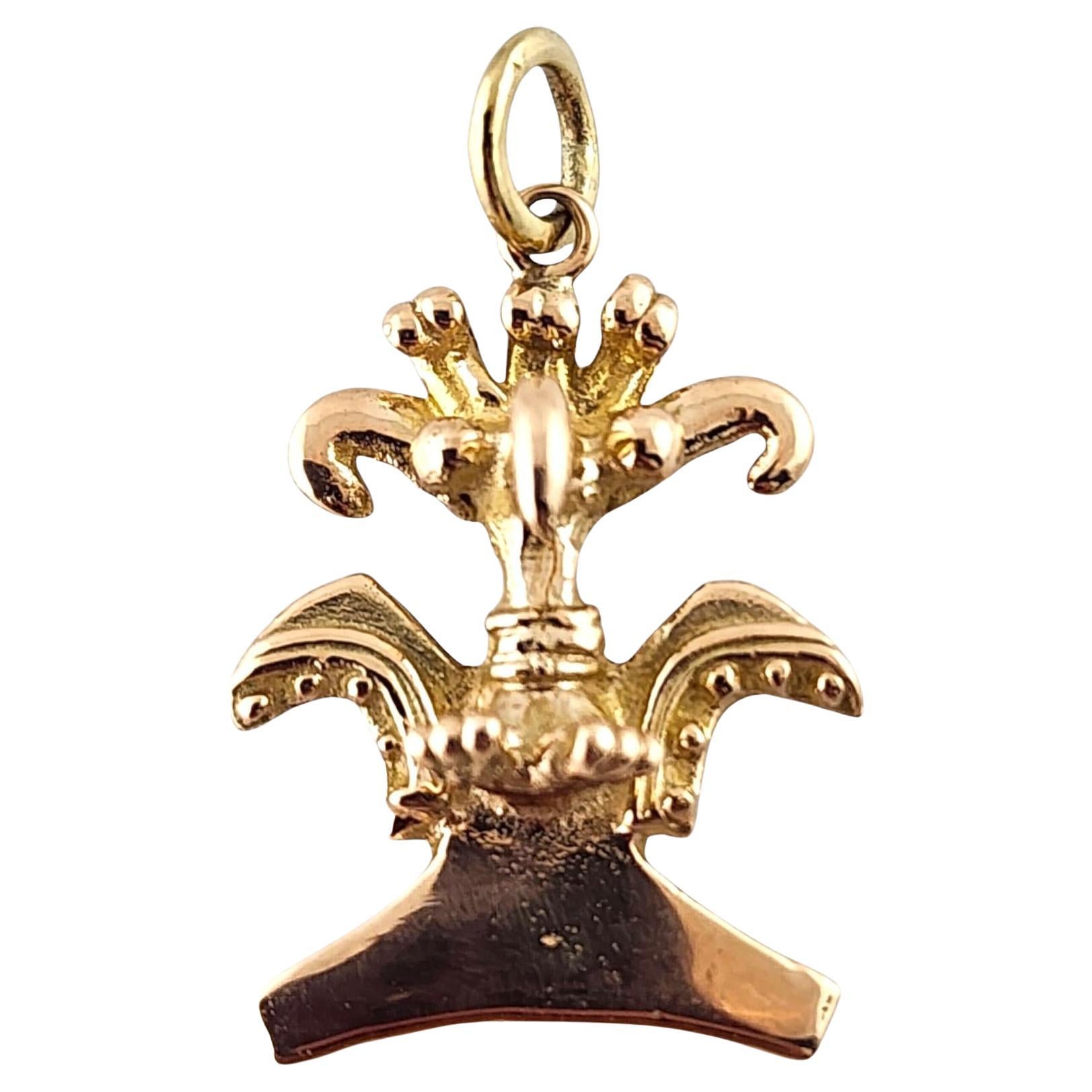 Charm a forma di uccello azteco in oro giallo 14 carati #18777