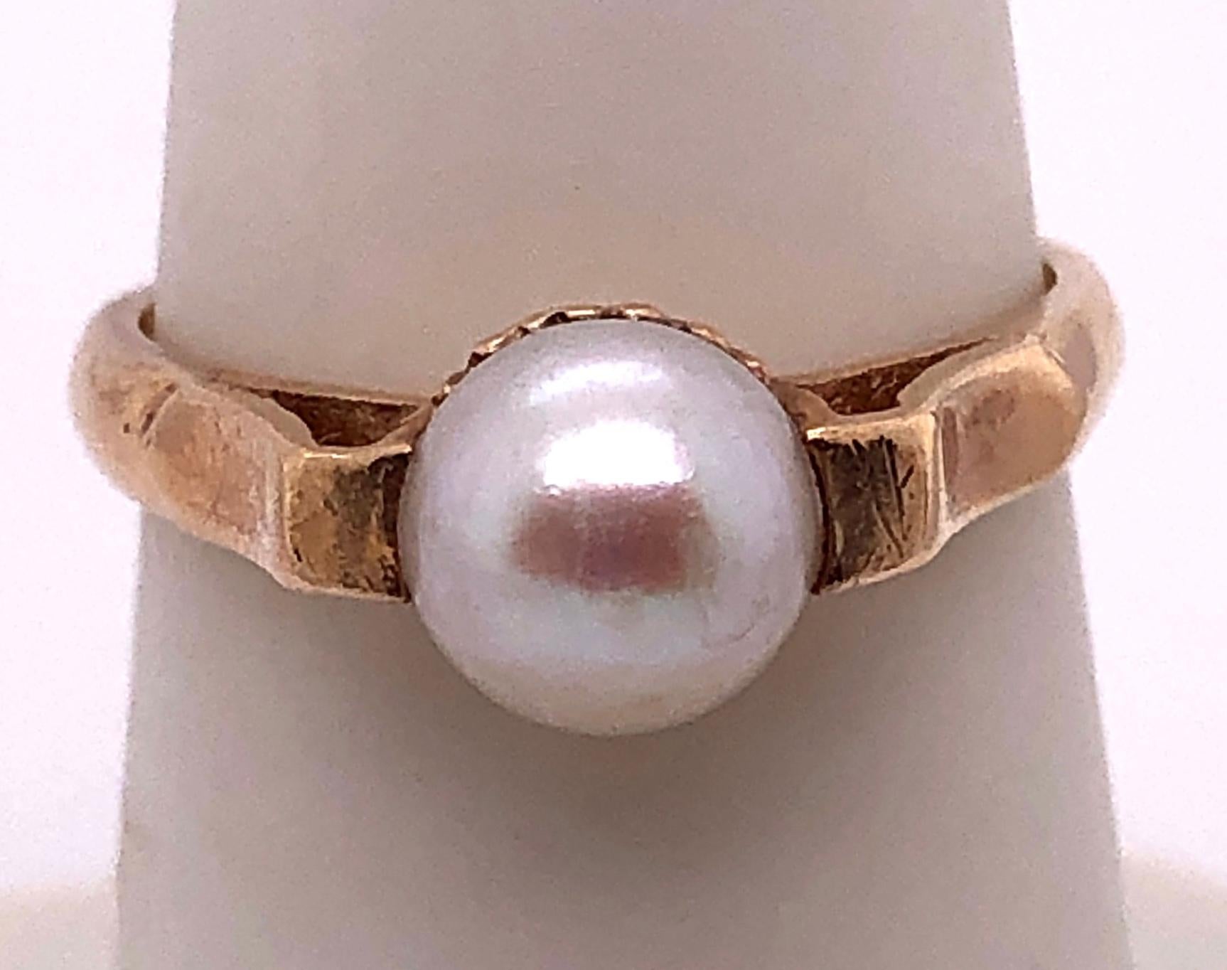 14 Karat Yellow Gold B & F Pearl Ring.
Size 6.5
3.5 grams total weight.
7 mm Pearl size.
Stamped 14K and B&F