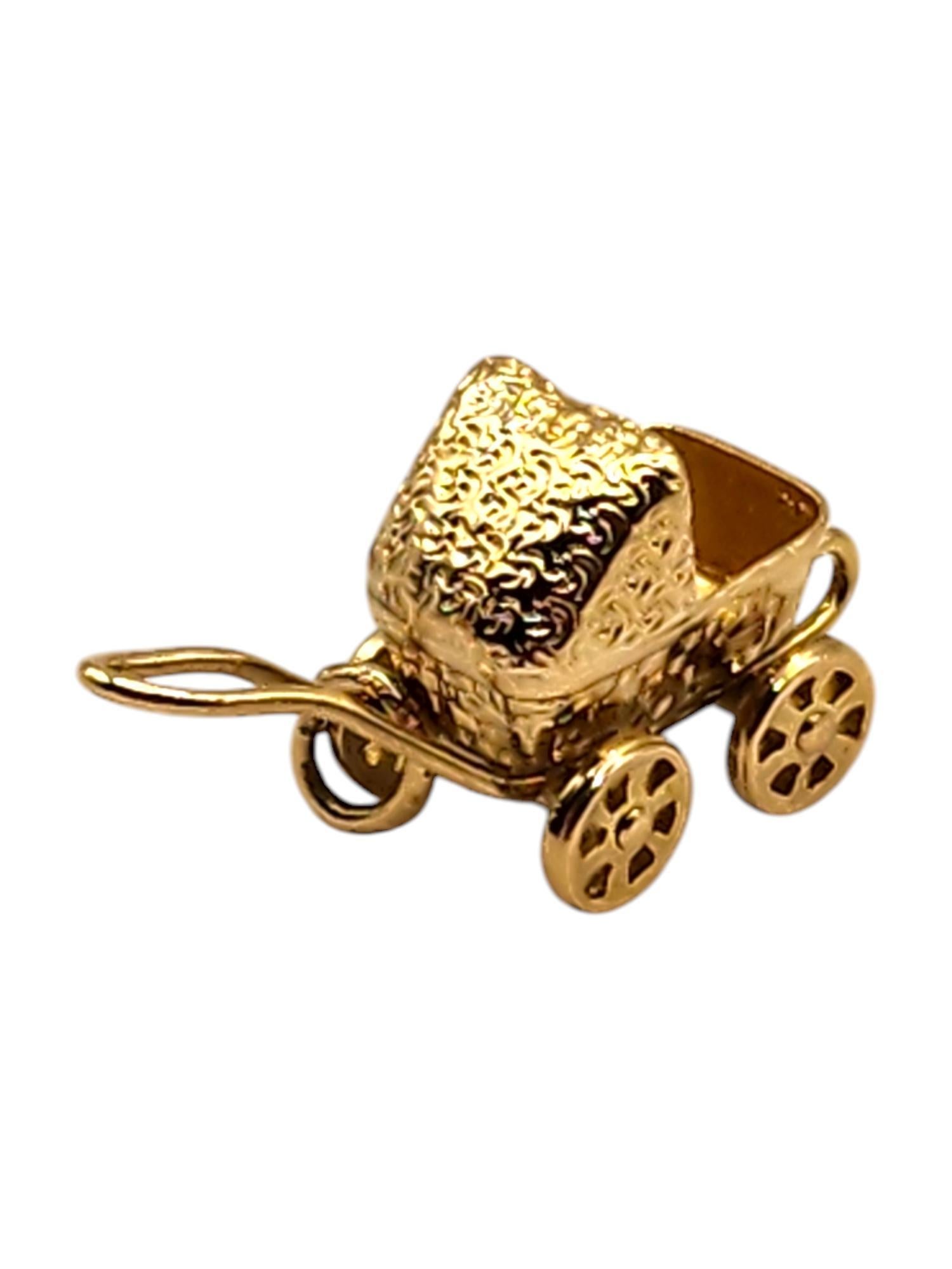 14 Karat Yellow Gold Baby Carriage Charm

This adorable charm was meticulously crafted from 14K yellow gold to represent a beautiful baby stroller!

Size: 21.63mm X 8.66mm X 11.64

Weight: 2.14 g/ 1.39 dwt

Hallmark:14K LMJ

Very good condition,