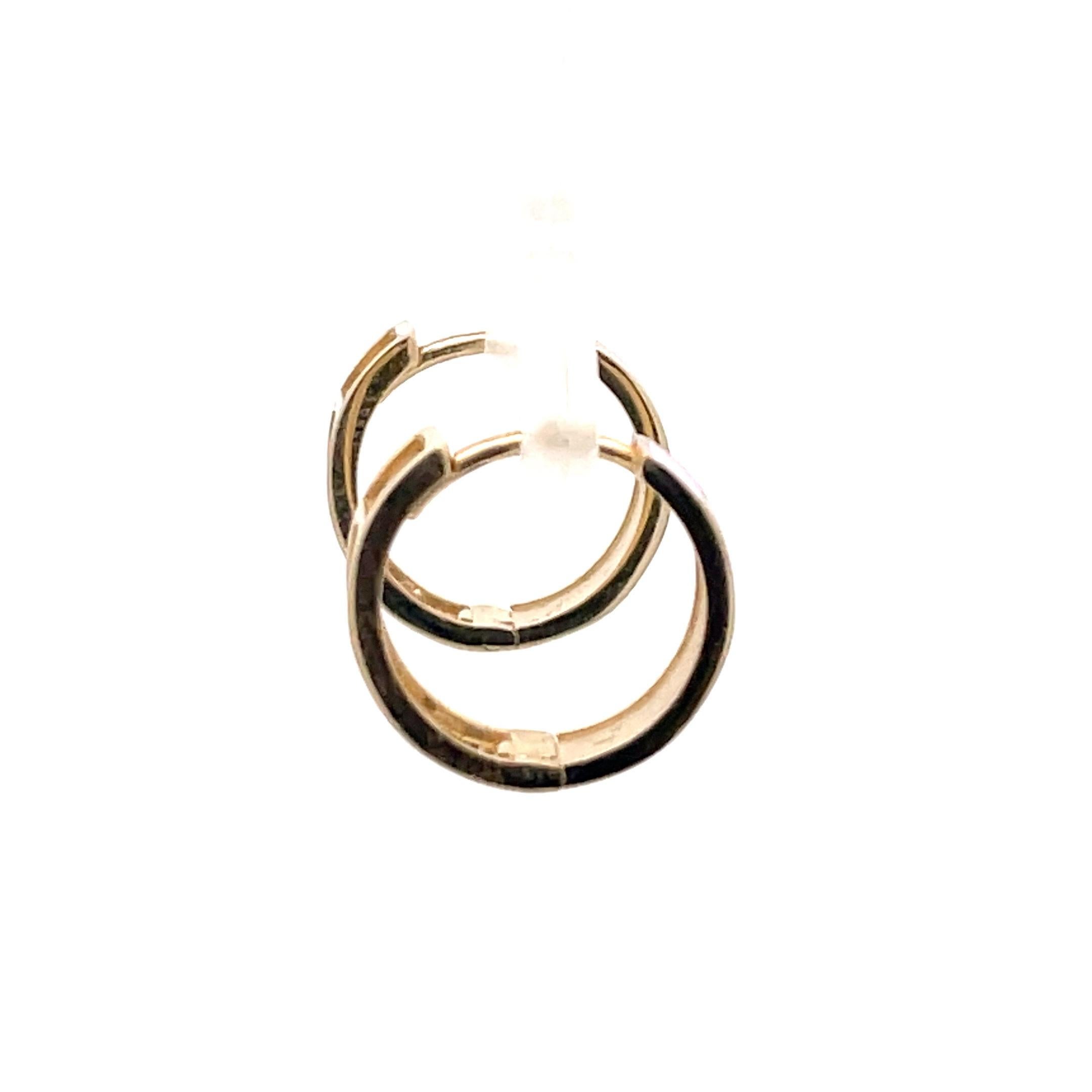 14 Karat Yellow Gold hoop earrings featuring baby pink enamel and gold heart motifs weighing 2.03 Grams.
Made In Italy