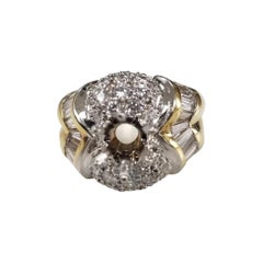 Anello in oro giallo 14 carati con pavé a canale, baguette e tondo