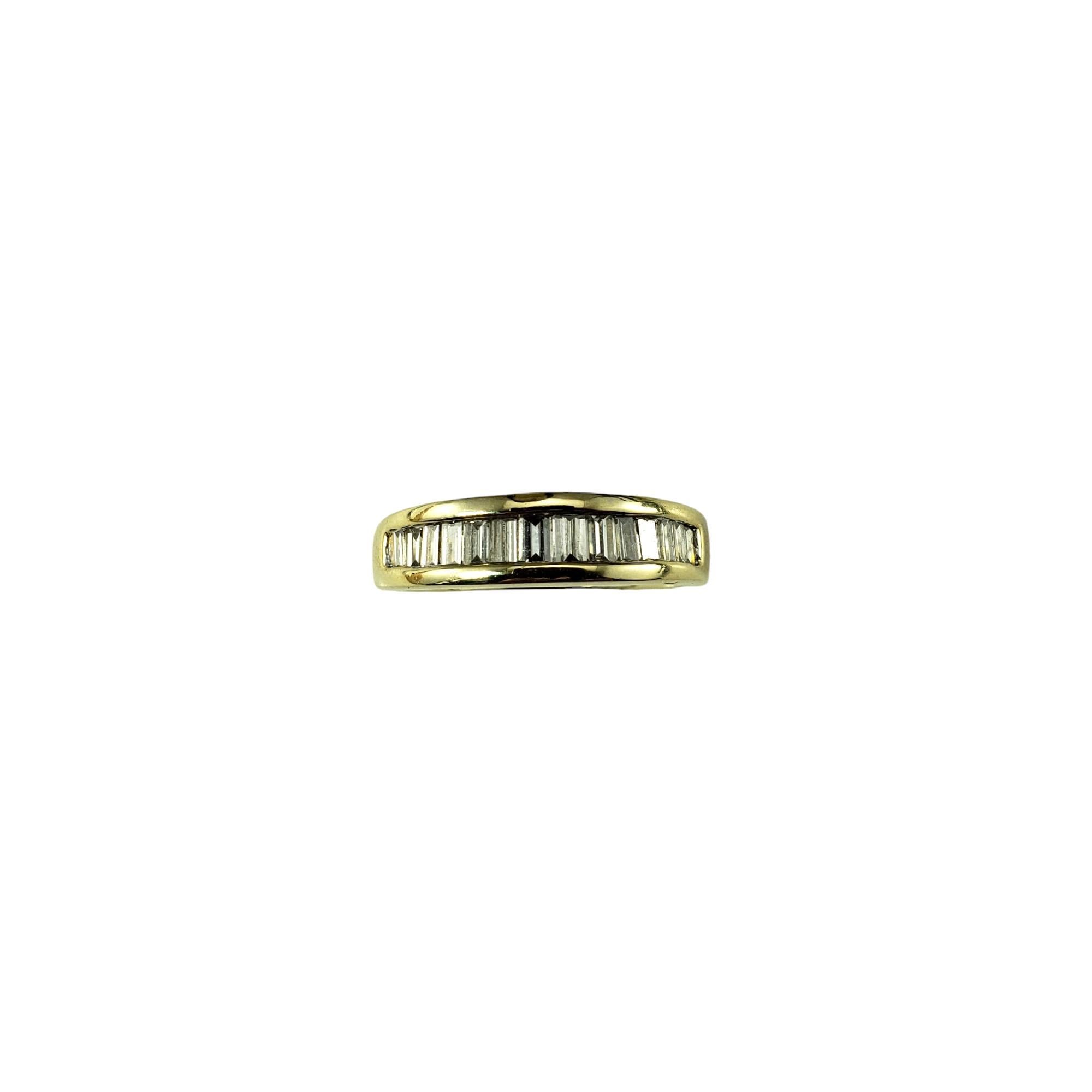 14 Karat Yellow Gold Baguette Diamond Band Ring Size 7.25

This sparkling band features 14 baguette cut diamonds set in 14K yellow gold.

Width: 5 mm. Shank: 3 mm.

Approximate total diamond weight: .40 ct. - .50 ct.

Diamond color: I-J

Diamond