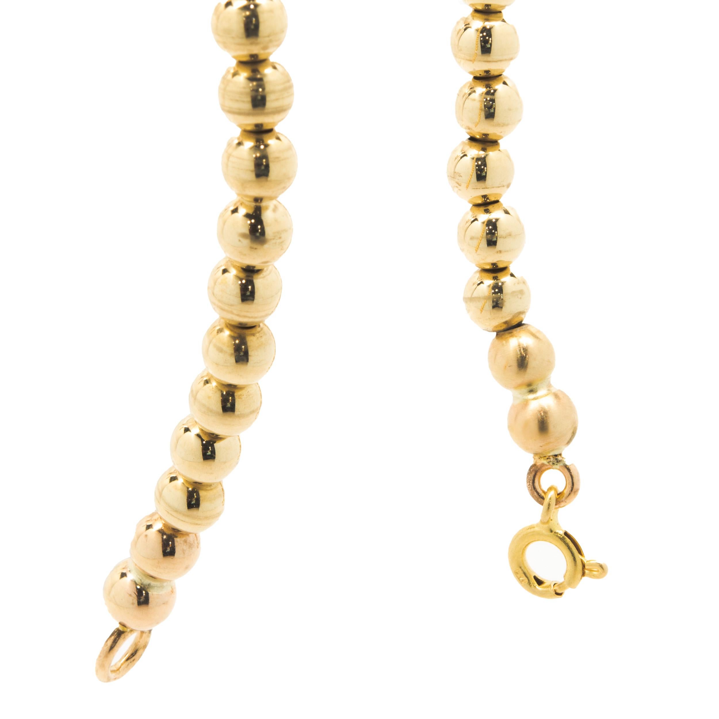 Material: 14K yellow gold
Dimensions: bracelet will fit up to an 6.5-inch wrist
Weight: 5.81 grams
