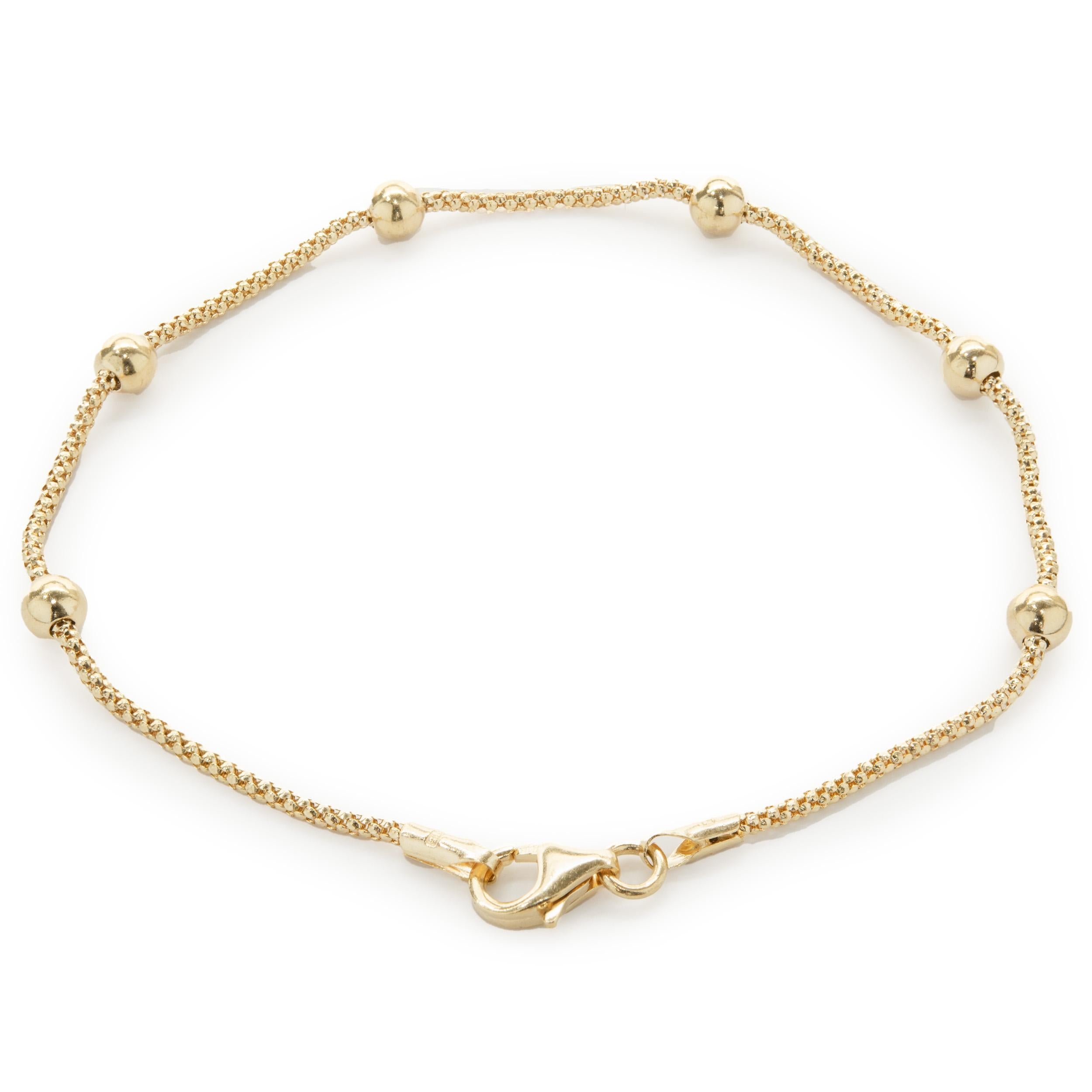 Matériau : Or jaune 14K
Dimensions : le bracelet mesure 7 pouces de long
Poids : 2,09 grammes