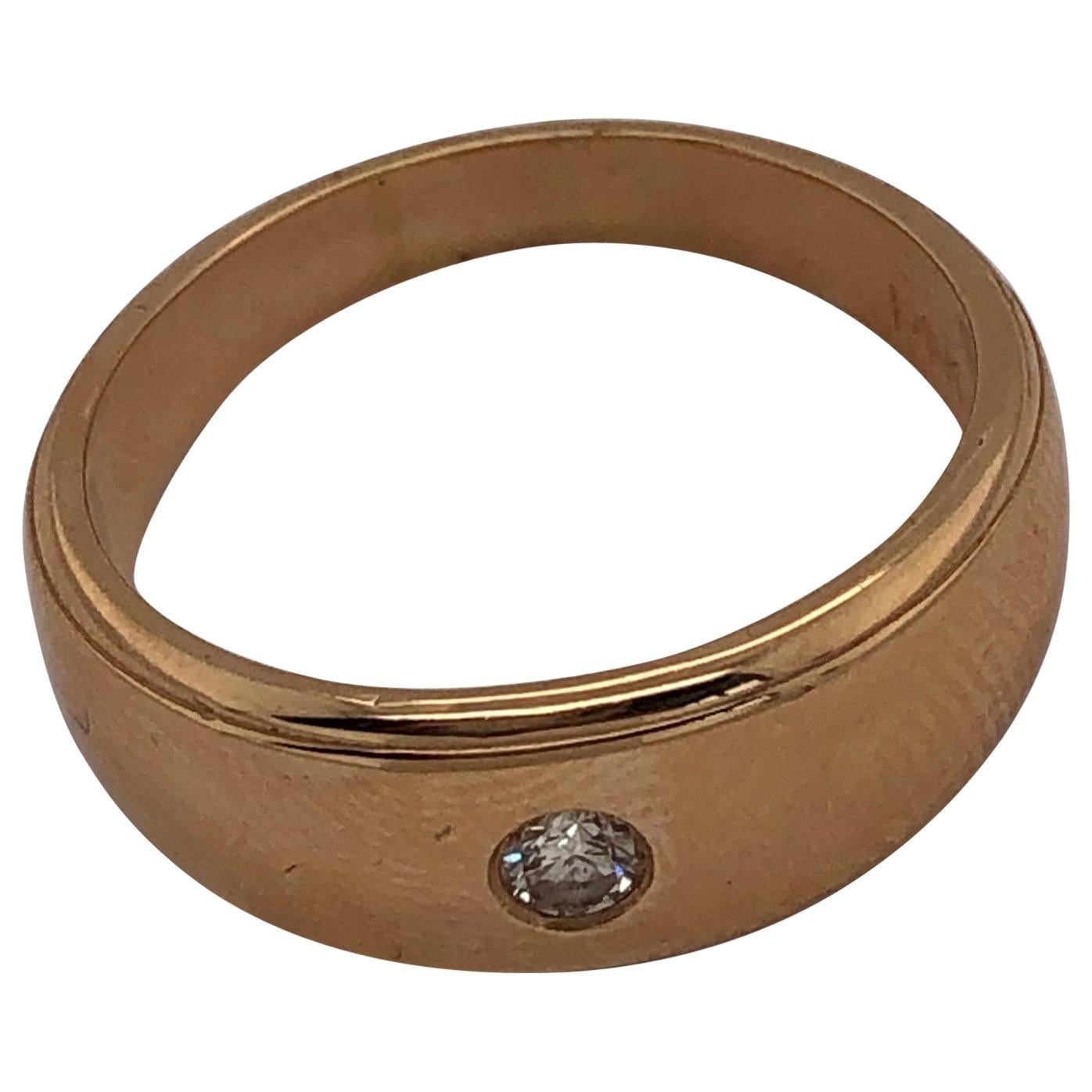 Anillo de oro amarillo de 14 quilates con diamante central redondo de 0,15 quilates