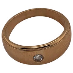 14 Karat Yellow Gold Band Ring with .15 Carat Center Diamond Round
