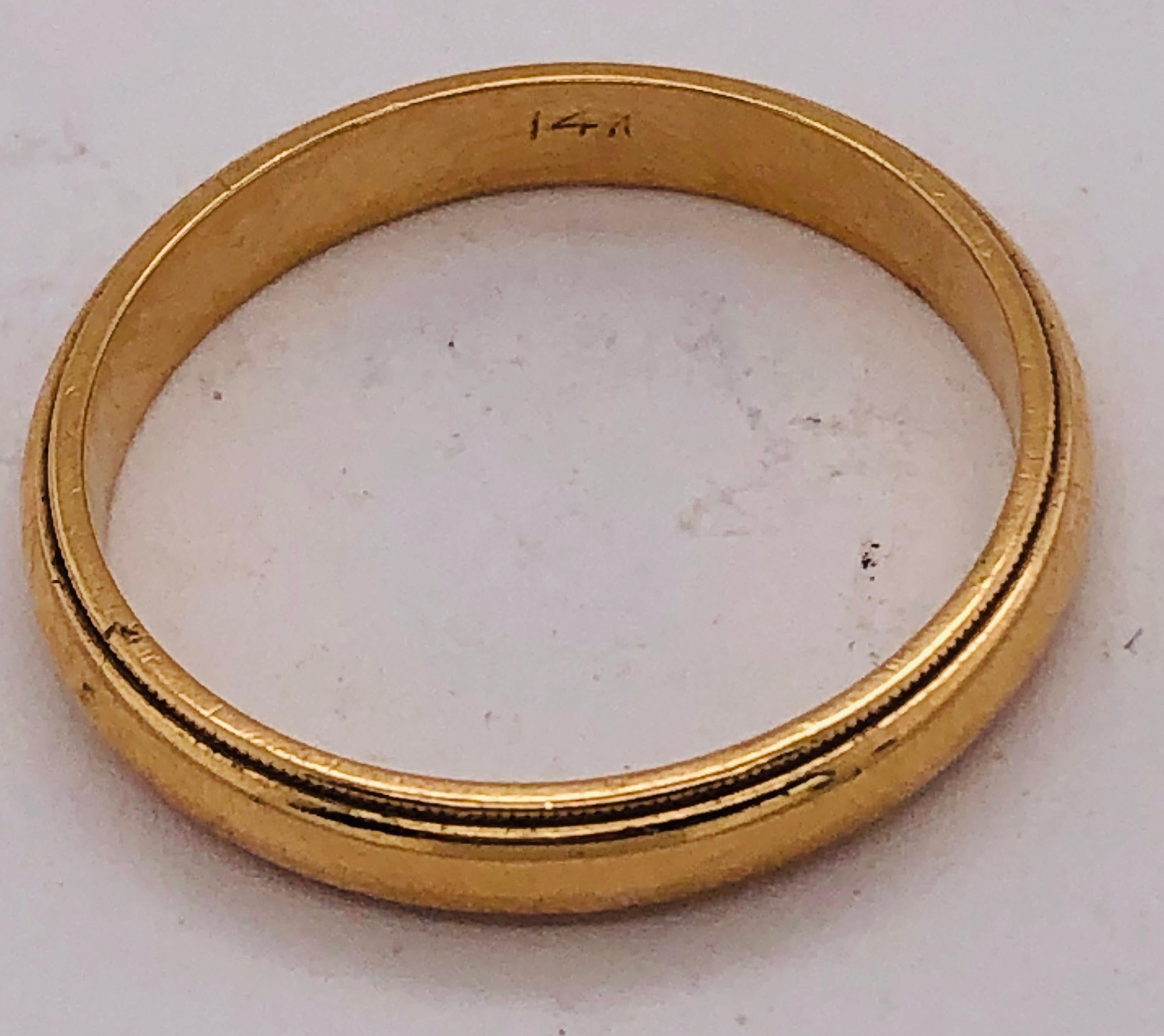 Modern 14 Karat Yellow Gold Band / Wedding Ring For Sale