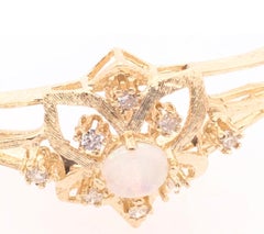 14 Karat Yellow Gold Bangle Bracelet with Center Opal and Diamond Accents