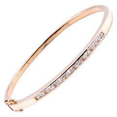 14 Karat Yellow Gold Bangle Bracelet with Diamond Accents