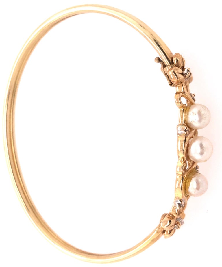 14 Karat Yellow Gold Bangle with Pearls and Diamonds at 1stDibs