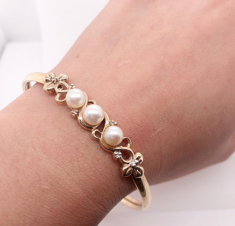 14 Karat Yellow Gold Bangle with Pearls and Diamonds at 1stDibs