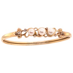 14 Karat Yellow Gold Bangle with Pearls and Diamonds