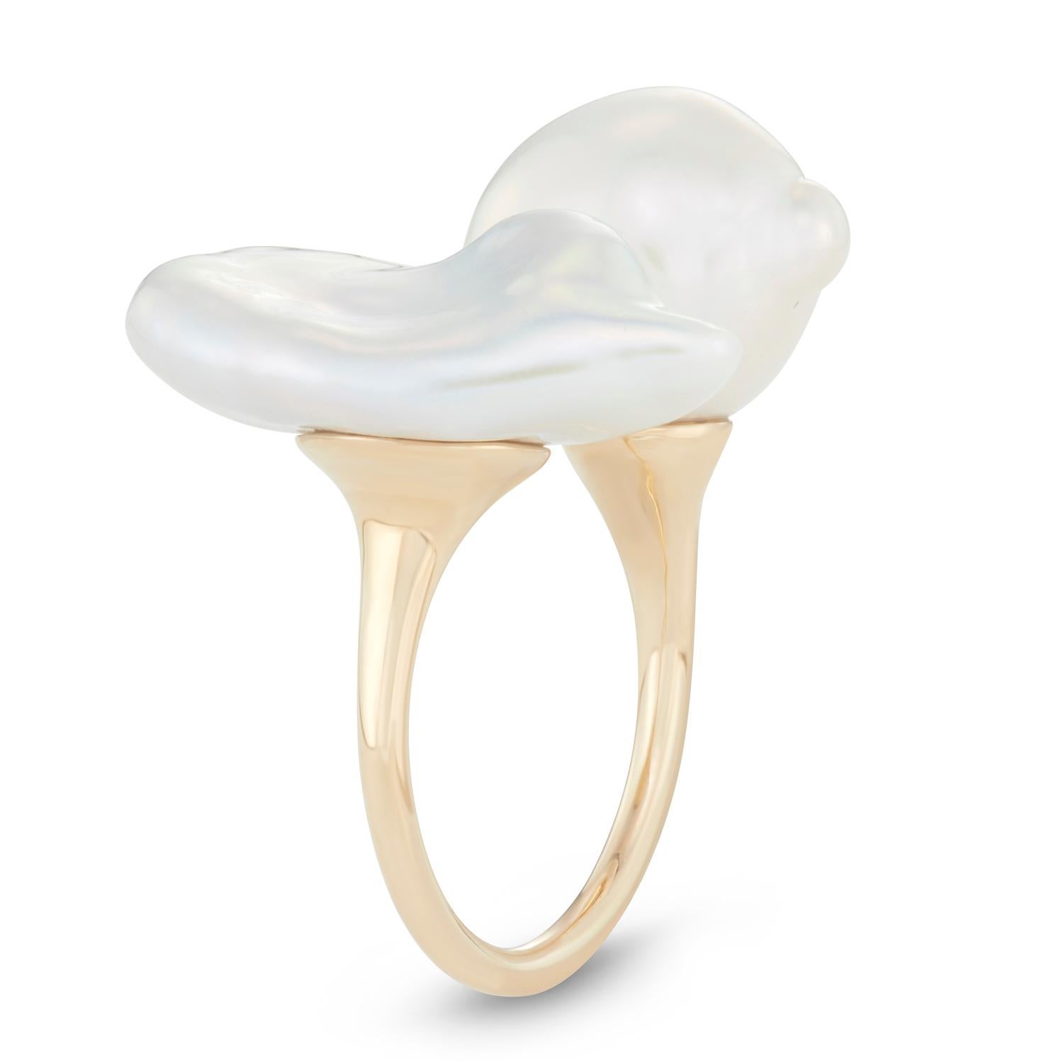 Not your traditional pearl ring, these bold cultured lustrous Baroque pearls are securely inset and pegged onto a tapered open U-shape band, making it adjustable to fit more than one ring size.
We like to wear it on our middle or index finger to