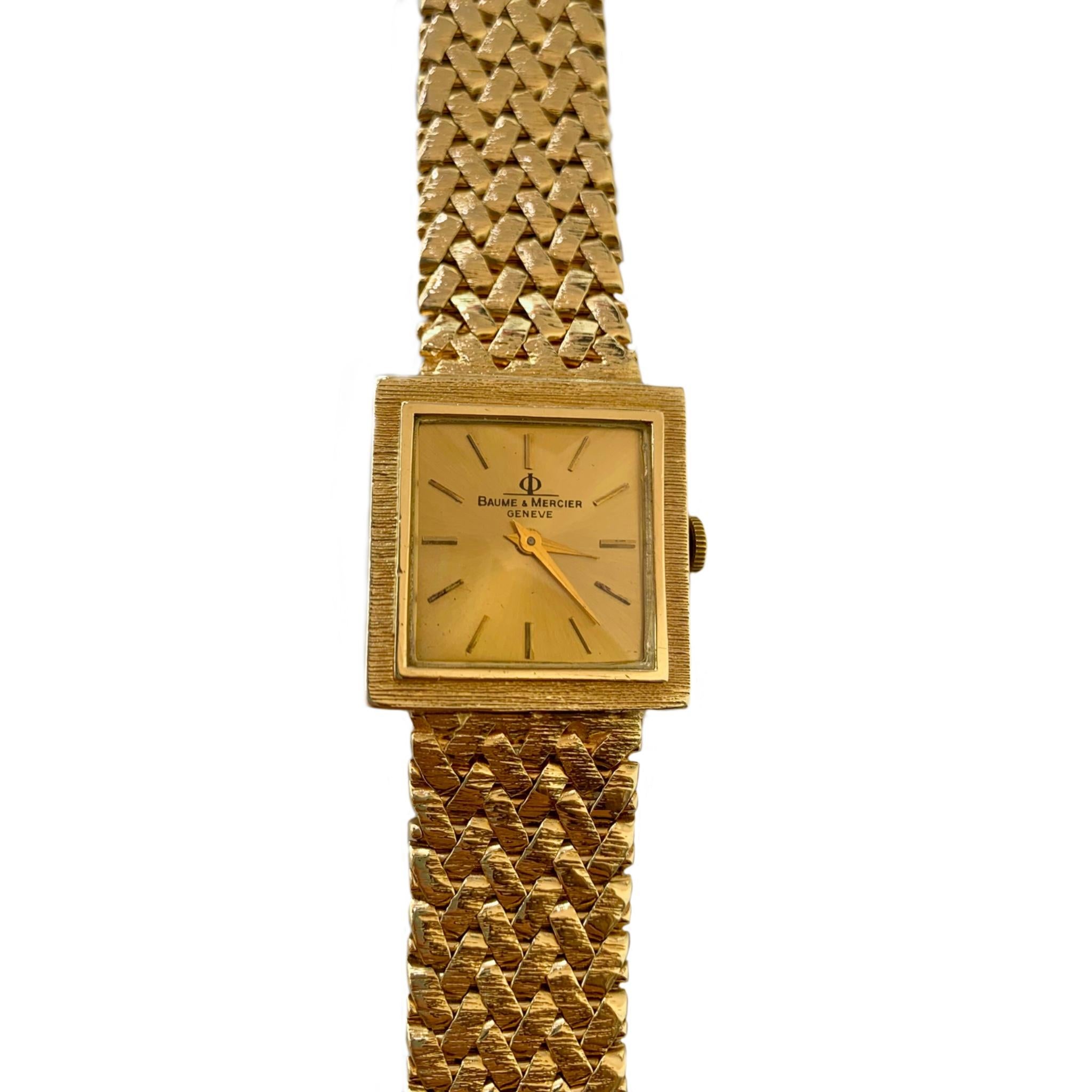 Vintage Baume & Mercier 14 karat yellow gold wrist watch circa 1960's. The rare square shaped case of 25mm contains the original 17 jewel Swiss movement. The flexible and comfortable linked band is 15.5mm wide, 7