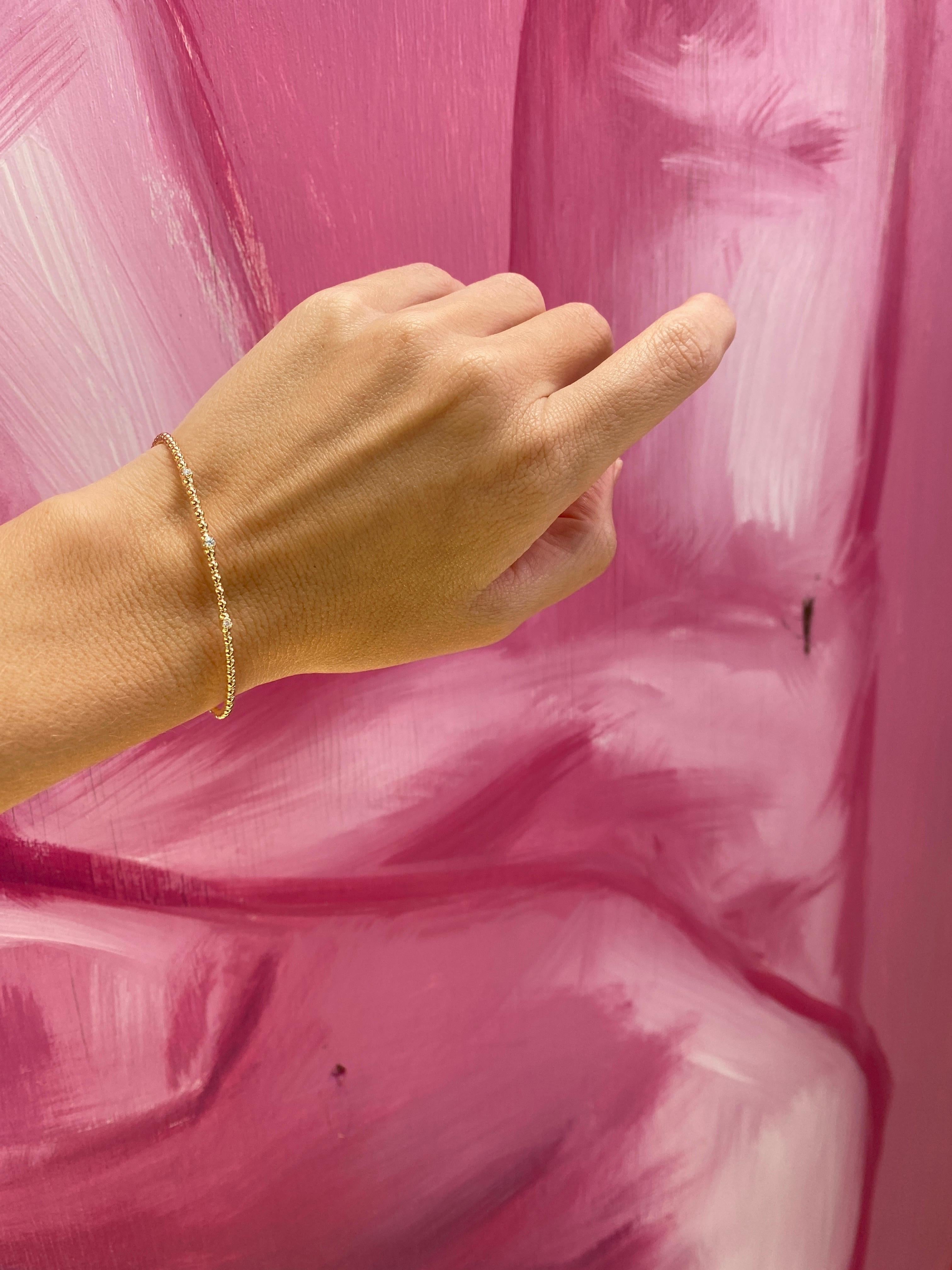 Armreif aus 14 Karat Gelbgold mit Perlen und flexiblem Diamanten 5