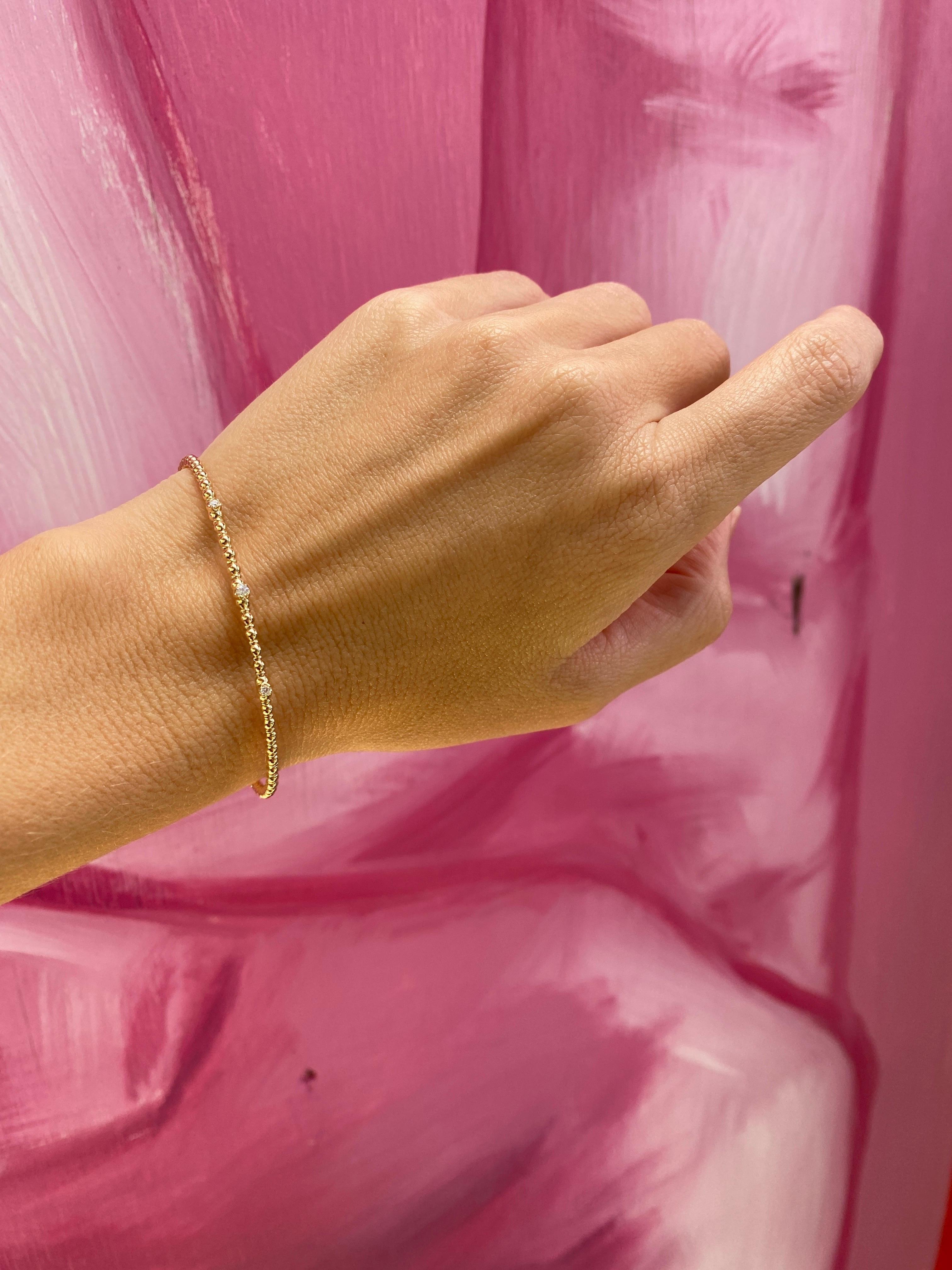 Armreif aus 14 Karat Gelbgold mit Perlen und flexiblem Diamanten 7