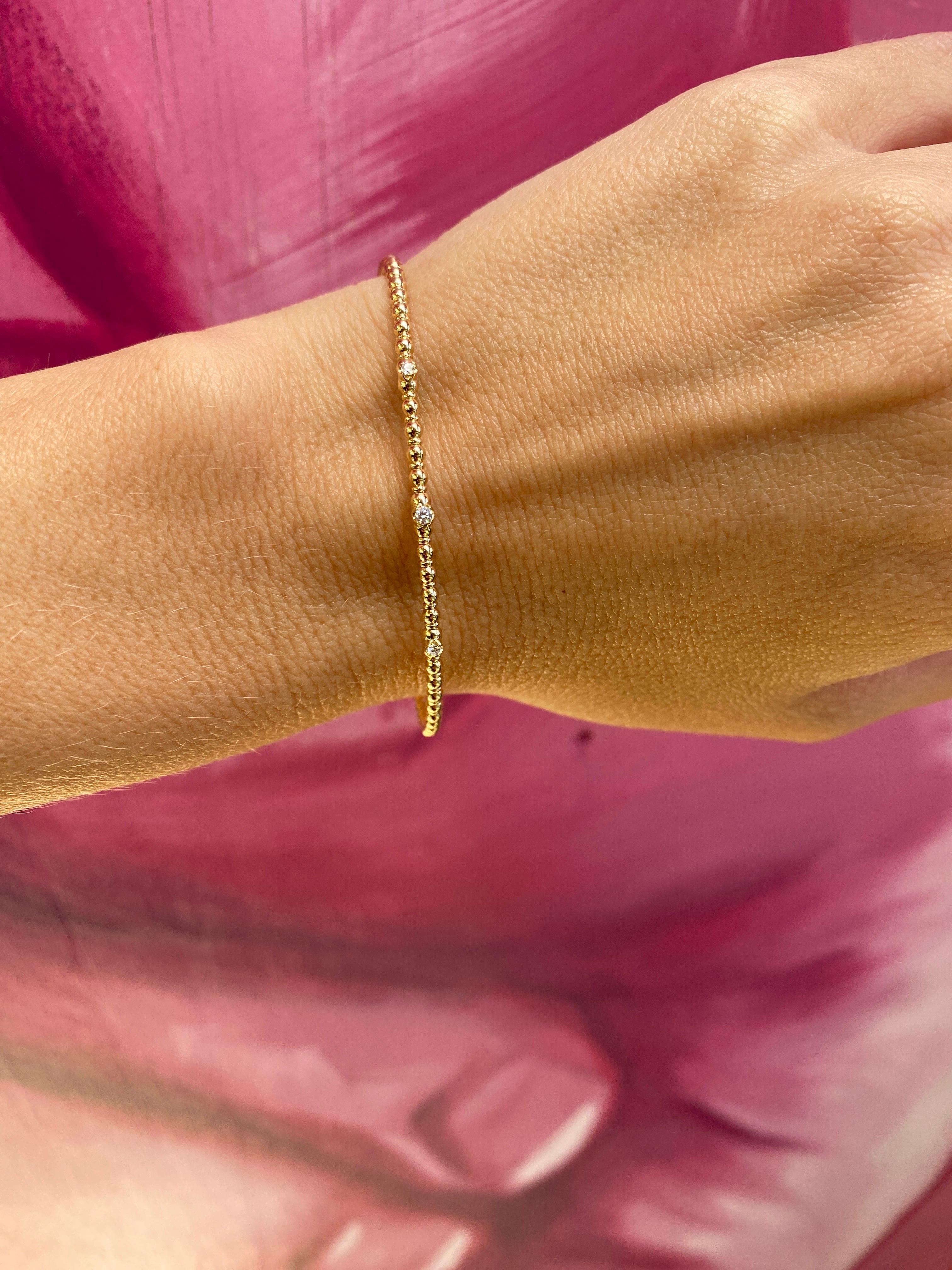 Armreif aus 14 Karat Gelbgold mit Perlen und flexiblem Diamanten 4