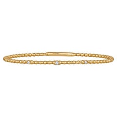 14 Karat Yellow Gold Beaded and Flexible Diamond Bangle