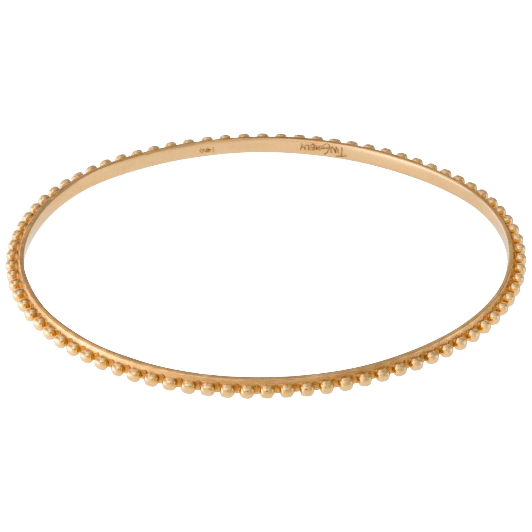 Bracelet jonc berbère en or jaune 14 carats et perles en vente