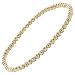 Pulsera flexible de cuentas de oro amarillo de 14 quilates